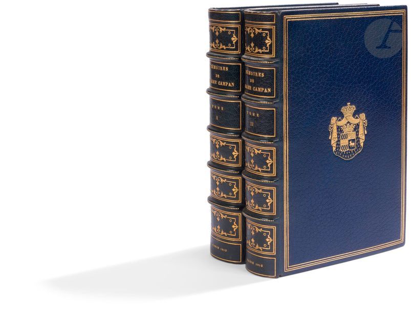 CAMPAN (Madame).
Mémoires… Sur la vie privée de Marie-Antoinette. Préface de René Vallery-Radot.
Paris : L. Carteret, 1910. — 2 volumes in-8, 212 x 140 : (2 ff.), XXV, 291 pp., 11 planches, couverture illustrée ; (2 ff.), 286 pp., (1 f.), 10 planches, couverture illustrée. Maroquin bleu foncé, triple filet doré en encadrement et armes dorées au centre sur les plats, dos à nerfs orné, encadrement de maroquin bleu foncé à l’intérieur, orné de filets et de motifs dorés, doublures et gardes de soie moirée bordeaux, doubles gardes, tranches dorées sur témoins, couverture et dos conservés, étui (P. Affolter 1911).

Édition des plus charmantes et très réussie, tirée à 300 exemplaires et illustrée de 63 compositions d’Adolphe Lalauze gravées au burin et à l’eau-forte par Léon Boisson, dont 21 bandeaux, 21 culs-de-lampe et 21 hors-textes.
Un des 70 exemplaires sur japon ou vélin, celui-ci sur japon, contenant 2 états des gravures, dont celui avant la lettre avec remarque.

Superbe exemplaire relié à l’époque par Affolter, aux armes de Jean Louis Napoléon Eugène Régnier quatrième duc de Massa (1875-1946) et de son épouse Odette de Boutray (1880-1961).

Exemplaire parfaitement conservé.
