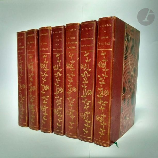 France, Anatole. [Works].
 7 works in 7 volumes in-18, red half sorrow, gilded net, smooth back decorated with golden leaves and flowers, speckled head
, not trimmed (period binding).
 Beautifully
 uniformly connected
 ensemble
, including:

 - Le Puits de Sainte Claire. Fourteenth edition. 

Paris: Calmann Lévy, 1895

 - Le Crime de Sylvestre Bonnard, member of the Institute. Forty-first edition. 

Paris: Calmann Lévy, 1898

 - Pierre Nozière. Paris: Alphonse

 Lemerre, 1899

 - Le Livre de mon ami. Paris: Calmann-Lévy

,[1902].

 - On the white stone. Paris: Calmann-Lévy

,[1903].

 - Crainquebille, Polecat, Riquet and many other useful stories. Paris: Calmann-Lévy

,[1904].

 - Jocast and the skinny cat. Paris: Calmann Lévy

, n.d.
 Very well preserved copies despite some friction. Browned leaves.
