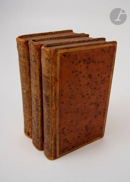 MARMONTEL.
Les Contes moraux.
Londres : 1780. — 3 volumes in-12, veau havane moucheté, triple filet doré en encadrement sur les plats, dos lisse, roulette dorée intérieure, tranches dorées (reliure de l'époque).

Édition illustrée d'un portrait de l'auteur par Cochin gravé par Dupin fils, un titre gravé répété dans chaque volume et 23 figures non signées qui sont de très jolies réductions des figures de Gravelot de l'édition de 1765. 
Petite note manuscrite page 147 du troisième tome.
Travaux de vers au dos et à la charnière inférieure du premier plat du premier volume, petit manque à la coiffe supérieure des deux premiers tomes, quelques rousseurs éparses et petites tâches d'encre.
Cohen, 688.