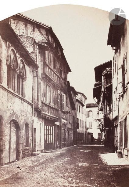 Félix Thiollier (1842-1914) 
Sites de la Loire, c. 1860-1870. 
Rue de Charlieu. 
Épreuve sur papier albuminé, cintrée, contrecollée sur carton. Légende à l’encre de la main du photographe sur le montage. 
18,5 x 13,4 cm

Félix Thiollier (1842-1914)
Sites of the Loire, c. 1860-1870.
Rue de Charlieu.
Albumen prints, mounted on cardboard. Caption written by photographer on mount.
18.5 x 13.4 cm