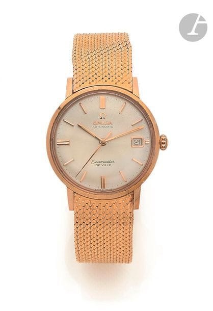 OMEGA Seamaster De Ville. Vers 1970
Montre bracelet pour homme en or jaune 18K (750), cadran doré, index bâtons appliqués formant les heures, date par guichet à 3h, mouvement mécanique à remontage automatique signé, calibre 562 N° 20696591, bracelet en or jaune avec sa boucle déployante siglée.
Cadran, boîtier et mouvement signés.
Diamètre : 35 mm
Poids brut : 98,2 g