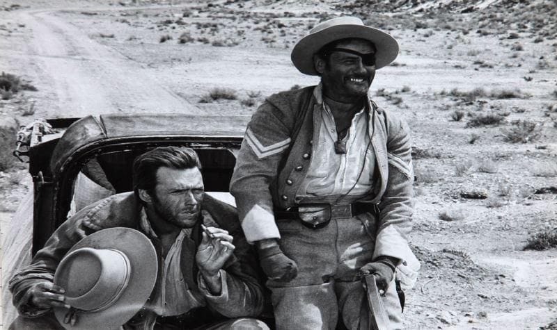 The good, the bad and the ugly (Le bon, la brute et le truand), 1966. De Sergio Leone, avec Clint Eastwood, Eli Wallach et Lee Van Cleef. Huit épreuves argentiques d'époque par Vaselli et divers. Tampon du photographe aux versos. 24 x 18 cm.