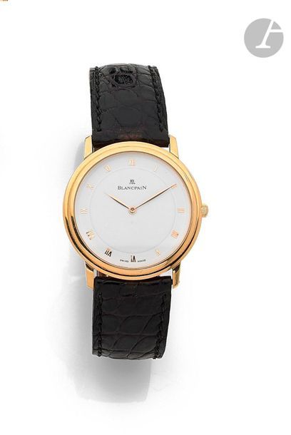 WHITE. Circa 1990N
 2905Men'
s wristwatch in
 18K (750) yellow gold, white dial with Roman numerals forming the hours, mechanical winding movement calibre 21, skeleton back showing the movement, leather strap with its
 signed
 18K yellow gold pin buckle
. Signed

 dial, case and movement

.

 Diameter:

 33 mmGross weight

: 40.5 g

