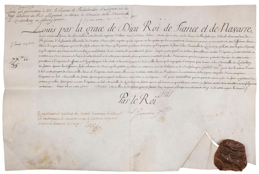 LOUIS XVI (1754-1793) Roi de France. P.S. (secrétaire), Versailles 17 février 1776 ; contresignée par son secrétaire d'État de la Guerre Claude-Louis de Saint-Germain ; vélin oblong in-fol., fragment de sceau cire brune (portrait joint).

Lettres patentes en faveur du baron de Flachslanden, " colonel commandant du Régiment d'infanterie allemande de Nassau ", lui permettant d'assigner " sur les fiefs relevant de nous qu'il possede en Alsace le douaire qu'il se propose de fixer à la Demoiselle de Landenberg qu'il est sur le point d'épouser [...] et notamment ceux de Stulsheim et de Traenheim "...