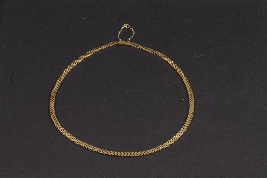 Chaine en or jaune (18 K) à maillons articulés. 
Poids : 15,8 g

