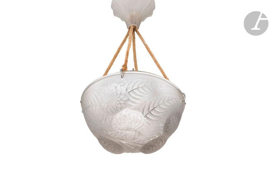 RENÉ LALIQUE (1860-1945
)Dahlias, model created in [1921], removed from the catalogue
 in 1932Cover

 complete with its bowl cover Cup and bowl cover in white molded-pressed glass (ref. Marcilhac 2459). Electrified suspensions in original trimmings. Traces of paint notably on the cover. Signed R. LALIQUE at the bottom in the centre of the basin. D. basin : 30 cm - H. 50 cm

