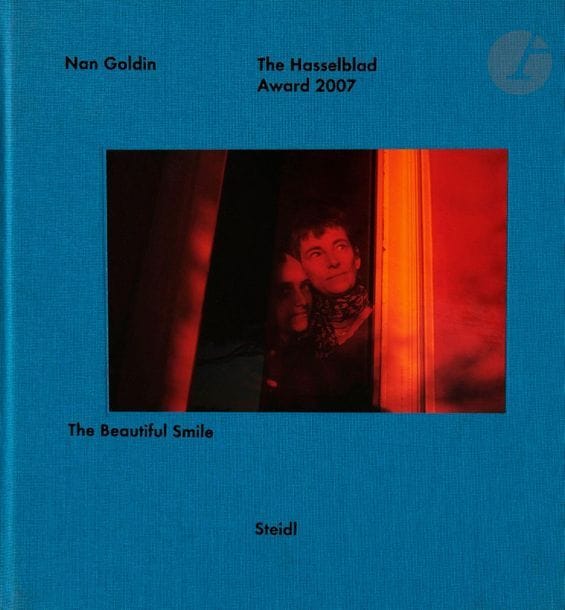 GOLDIN, NAN (1953
)The Beautiful
Smile.

Steidl,

2007


.In-4 (27.5 x 26 cm). Original edition. 174 pp. Bound in blue cloth with photographic label laminated.




























































































