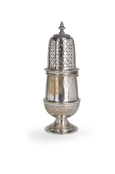 FRANCE FIRST HALF OF THE XVIIIth CENTURYA
baluster with silver-plated metal bayonet engraved with a wedding band coat of arms surmounted by a count's crown. The circular pedestal with a doucine is enhanced on the first doucine with floral motifs in geometrical recessed frames on the rim of the lid. The body is engraved with Regency motifs: fleurons, falling draperies on a background of crossbars and amatis. The dome is surmounted by a spinning top grip on a terrace of gadroons.
Condition: wear to the original plating, not re-silvered, slight deformation at the pedestal.
Height: 22.5 cm - 
diameter of the pedestal: 7.2 cm
.


