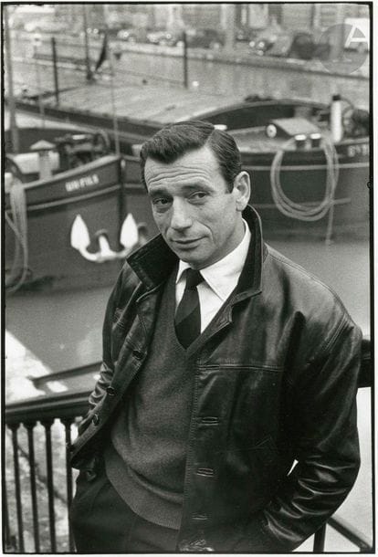 Sabine Weiss (1924
)Yves
 Montand, 1959,

 silver print (c. 2000). Stamp "Sabine Weiss", signature, dedication, negative number, title and date in pencil

 on verso.

 Image: 21.8 x

 14.7 cmSheet

: 24 x 18

 cm 
