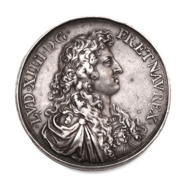 LOUIS XIV. 1662. Médaille: Libéralité du roi pendant la famine. Argent. J.VARIN.

D : 50 mm. 

M.M. 103 A.

Chocs sur la tranche.

Très bel exemplaire.