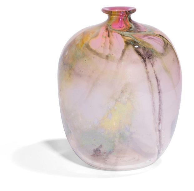 Claude MONOD [French] (1944-1990
)Round blown glass vase with a small neck, with cloudy decoration of green, mauve and black oxides. Signed, dated 1980 and numbered E.36.42.29 under the
 base.

 Height : 16 cm - Diameter : 12 cm

