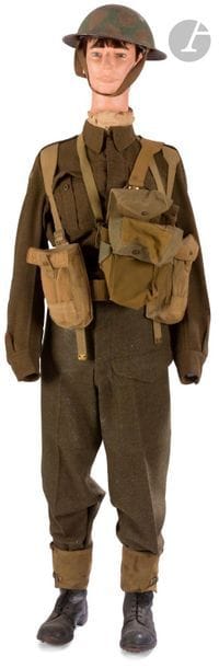 Canadian infantryman 2nd GM. 
Pants, jacket, gaiters, embroidery, bayonet nail, cartridge belt, water bottle. 
With camouflaged helmet and division insignia (repainted).

