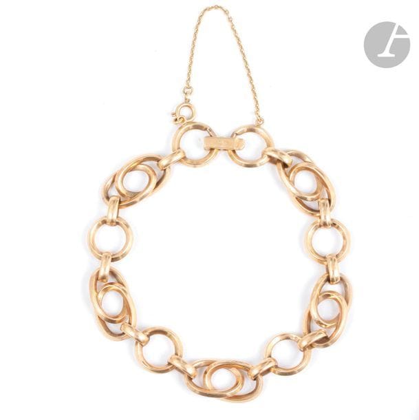Bracelet en or 18K (750), articulé de maillons ronds et ovales alternés.
Longueur : 20,5 cm environ.
Poids brut : 31,2 g 
