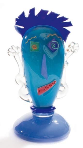 Fernando AGOSTINHO (né en 1959)
Tête Epreuve en verre multicolore et applications sur fond bleu. Numérotée, datée. Hauteur: 38 cm.