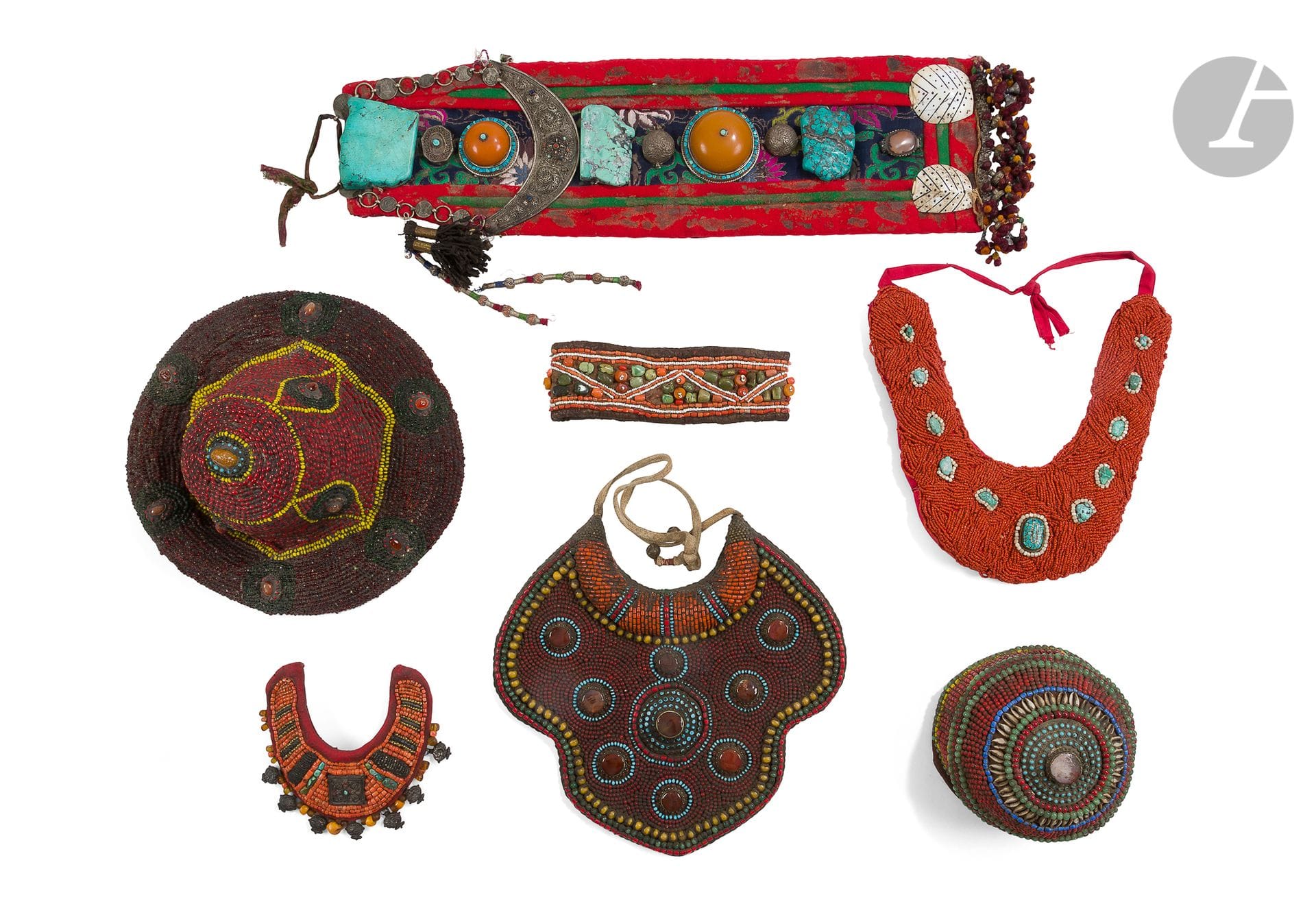 
Seven ethnic ornamental ornaments, Tibet and Ladakh, 20th century



A hat, a bonnet, a headband, three bib necklaces and an ornament. The set is decorated with turquoise, coral, glass, carnelian and cowrie stones.





Lots 271 - 275 : 

For obvious reasons of simplicity of our descriptions we have used the terms: headdress, tiara, breastplate and pectoral, as for example for the tiara of lot 271 given sometimes as a female oracle's headdress, a nobleman's or king's tiara, or as a llama's tiara worn during funeral ceremonies. But also for the toque of lot 275 which can be given as a perak headdress, Ladakh, Zanskar, woman's headdress, Nubra valley, Changthang highland headdress, or Hunza headdress, Pakistan. And even if many museums, such as the Castre Museum in Cannes (now the Museum of World Explorations), the Natural History Museum of Lyon, or the Mingei International Museum of San Diego in California, present similar headdresses, following the controversies of these last years on this subject, nothing allows us, today, to affirm that these pieces were worn by members of ethnic groups of Ladakh or other regions of the Himalayan foothills. We will therefore consider that these pieces are presented only as decorative objects of the 20th century.
