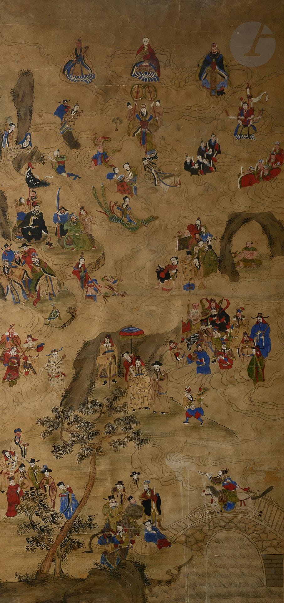 Taoist painting, ink and polychrome on paper, China, 19th century 
Representing the main deities of the Taoist pantheon including the Jade Emperor, the Yellow Emperor, the Queen Mother of the West holding her sceptre in her left hand seated on the back of a phoenix and the eight immortals
124 x 59 cm 
Framed under glass. Accidents.


