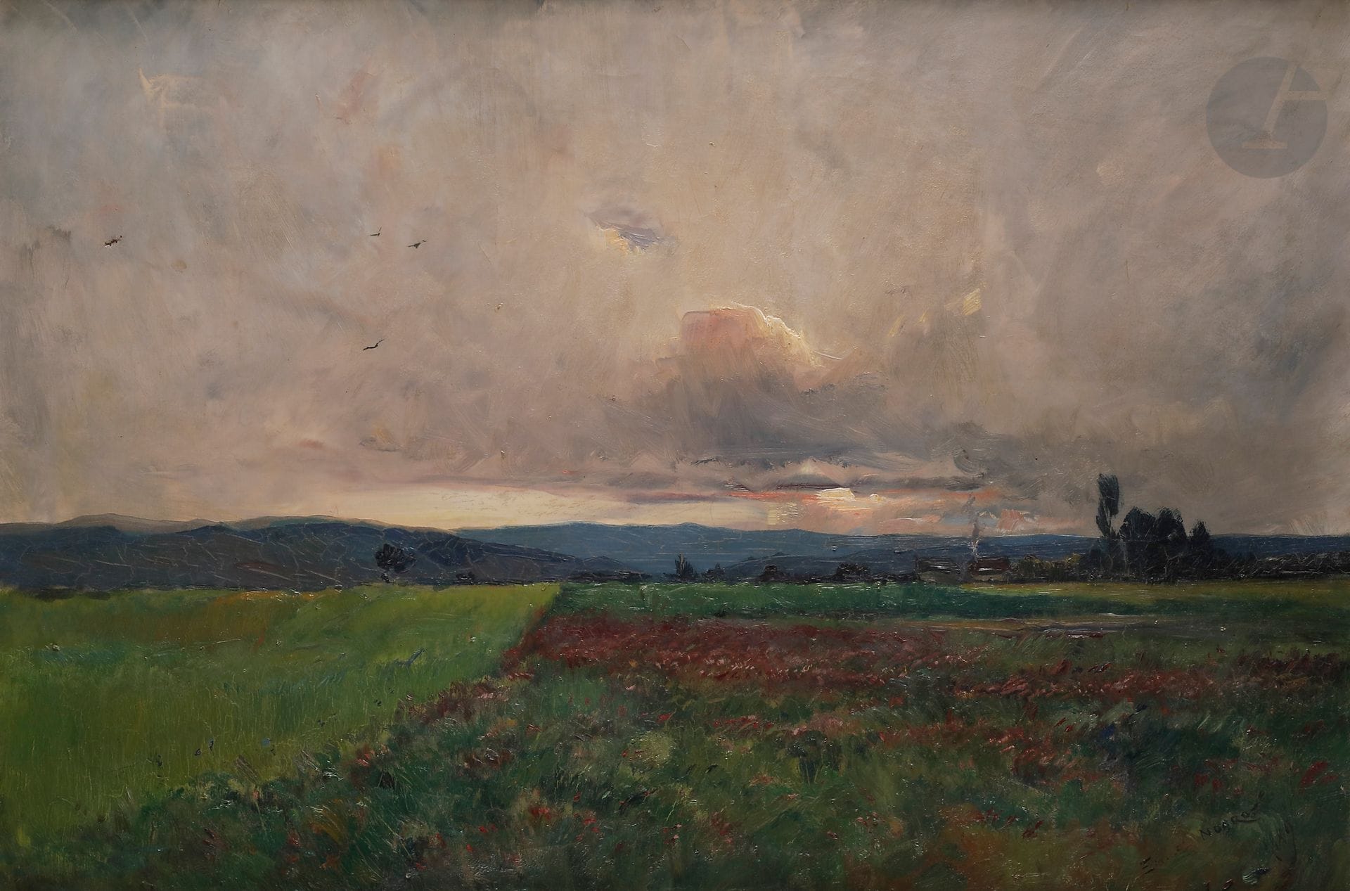 Émile NOIROT (1853-1922) 
Soir d'orage, 1889 
Huile sur toile. 
Signée et datée en bas à droite. 
Signée, datée et titrée " Herbage fleuri " au dos. 
(Petit accident). 
50 x 73 cm