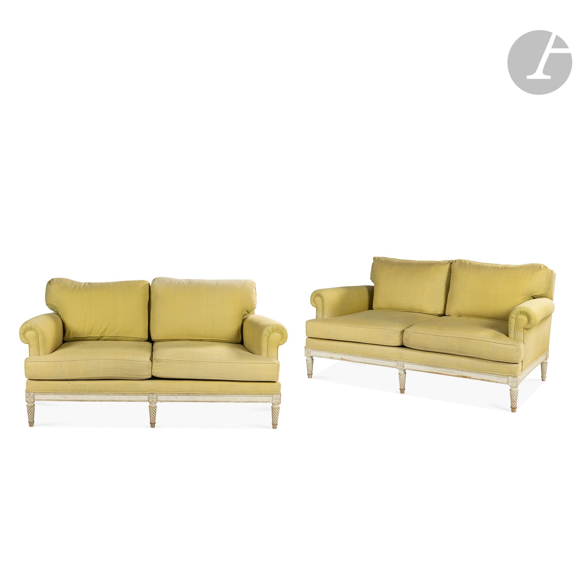 ATTRIBUTED TO CARLHIAN DECORATION - MICHEL CARLHIAN (1911-1975) & ROBERT CARLHIAN (1910-2001
)Pair of 2-seater sofas. The bases and the feet treated in the Louis XVI taste and lacquered mastic. The backs, armrests, seat fronts and cushion tops upholstered. H. 78 cm - L. 160 cm - W. 79 cm
