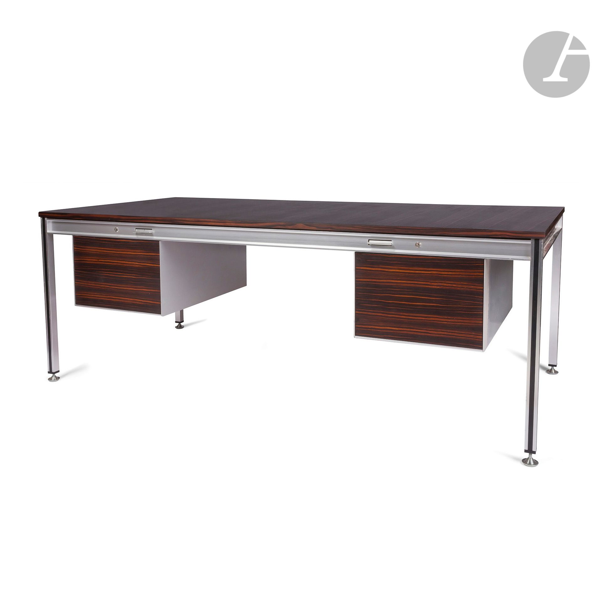 CLAUDE GAILLARD (20th) AND HENRI LESETRE (20th) DESIGNERS & TFM PUBLISHERImportant
flat executive desk with two suspended pedestals; one with two drawers, the other with a single deep drawer. The frame is made of aluminium profile, the pedestals of folded aluminium sheet. The top and drawer fronts are made of Macassar ebony veneer. The belt shows the automatic opening pushers of each drawer. Circa 1960/70. H. 76 cm - W. 200 cm - D. 100 cm
