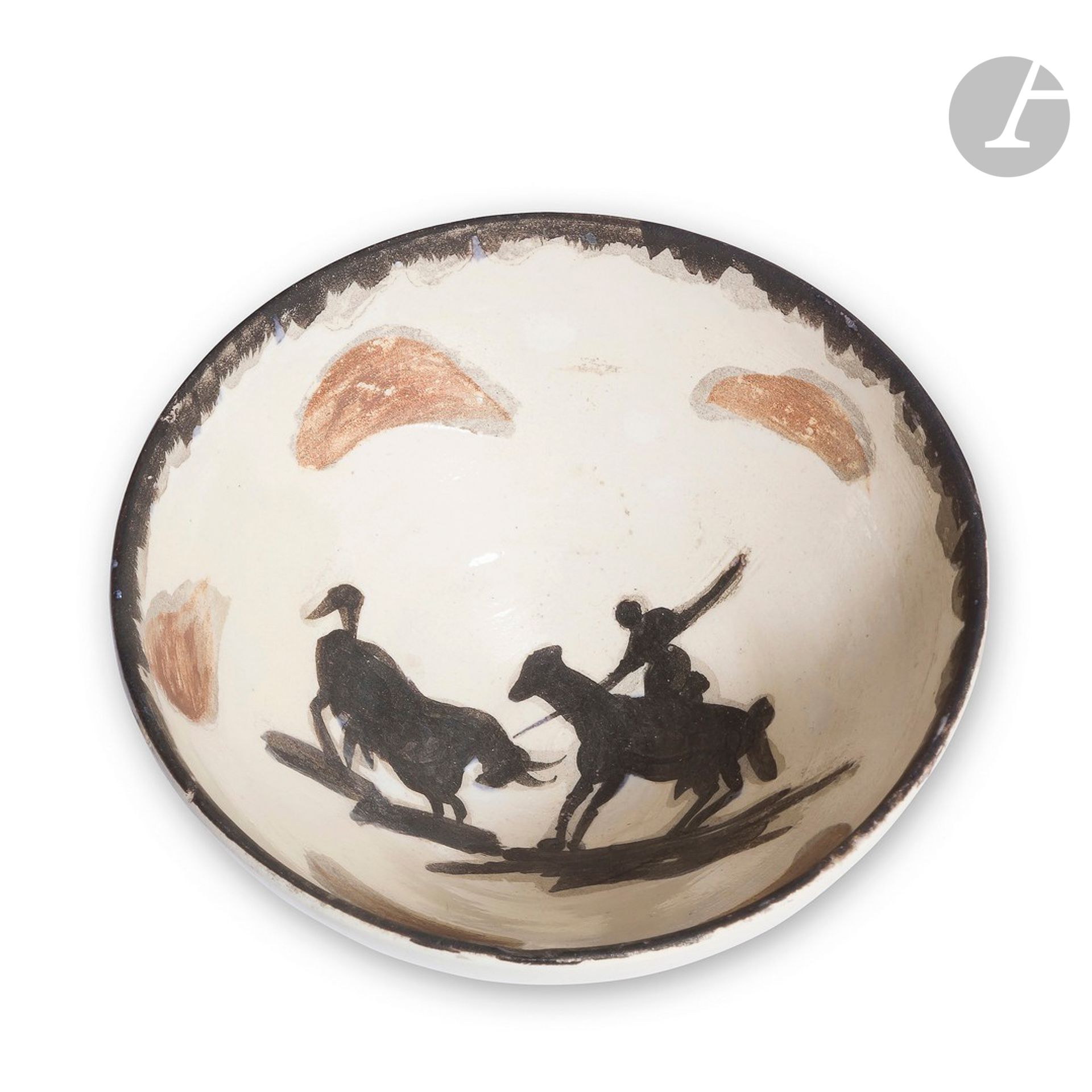PABLO PICASSO (1881-1973) & ATELIER MADOURA 
Picador, le modèle créé en [1955]
Coupelle ronde tournée. Réplique authentique limitée éditée et réalisée à cinq cents exemplaires chez Madoura. Épreuve en terre de faïence blanche, décor aux engobes et paraffine, émail blanc ; noir, rouge. Restaurations, une légère égrenure en bordure. Marquée Édition PICASSO au revers. H. 5,5 cm – D. 12,3 cm

Bibliographie : 
Alain Ramié - Picasso, catalogue de l’œuvre céramique édité 1947-1971 - Éditions Madoura, 1988. Modèle identique reproduit page 150 et référencé sous le numéro 289.