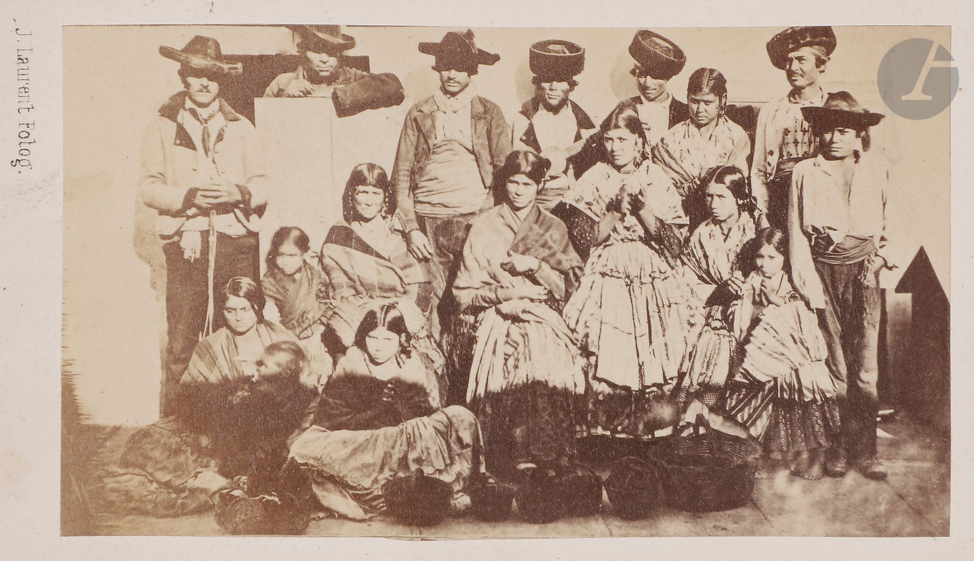 Jean Laurent (1816-1886)
Espagne, c. 1860.
La reine Isabelle II. Infante Isabel. Infant Don Francisco. Infant Don Erique. Duc et duchesse de Montpensier. Cardinal-archevêque de Tolède. Cardinal-archevêque de Saint-Jacques de Compostelle. Sor Patrocinio. Général Rosales. Général Serrano del Castillo. Général Concha. Le poète Francisco Martínez de la Rosa. Duc de Medinaceli. Duc d’Albe. Le peintre Federico de Madrazo. Baronne de Hortega. Le prince Muley-Abbas. Costumes calabrais. Costumes de bal. Costumes d’oiseaux du paradis. Marocains. Aragonais. Bohémiens. Diseuses de bonne aventure. Caricatures de Jean Laurent. Le ténor Fraschini. Cirque. Éléphants. Dresseur de chevaux. Numéros équestres. Toréador. Picador. Banderilleros. Entraînements de Toréadors. Le fameux Cuchares. Courses de taureaux. Taureaux dans l’arène. Paysans de Galice. Reproductions de peintures. Francfort. 
Album in-4, plats en bois ajourés, composé de 206 épreuves sur papier albuminé au format carte de visite, contrecollées sur cartons du photographe et insérées dans les feuillets. Nombreuses annotations à l’encre sur les montages.
Format moyen : 8 x 5,5 cm

Jean Laurent (1816-1886)
Spain, c. 1860.
Queen Isabel II. Infante Isabel. Infant Don Francisco. Infant Don Erique. Duke and Duchess of Montpensier. Cardinal-Archbishop of Toledo. Cardinal-Archbishop of Santiago de Compostela. Sor Patrocinio. General Rosales. General Serrano del Castillo. General Concha. The poet Francisco Martínez de la Rosa. Duke of Medinaceli. Duke of Alba. Painter Federico de Madrazo. Baroness of Hortega. Prince Muley-Abbas. Calabrian costumes. Ball costumes. Costumes of birds of paradise. Moroccans. Aragonese. Gypsies. Fortune tellers. Photographer's caricatures. Tenor Fraschini. Circus. Elephants. Horse trainer. Equestrian numbers. Toreador. Picador. Banderilleros. Training of Toreadors. The famous Cuchares. Bull races. Bulls in the bullring. Farmers of Gallicia. Reproductions of paintings. Frankfurt. 
4to album, composed of 206 albumen prints (carte-de-visite dimensions), mounted on studio's cardboard. Several annotations on mount.
Average size: 5.5 x 8 cm