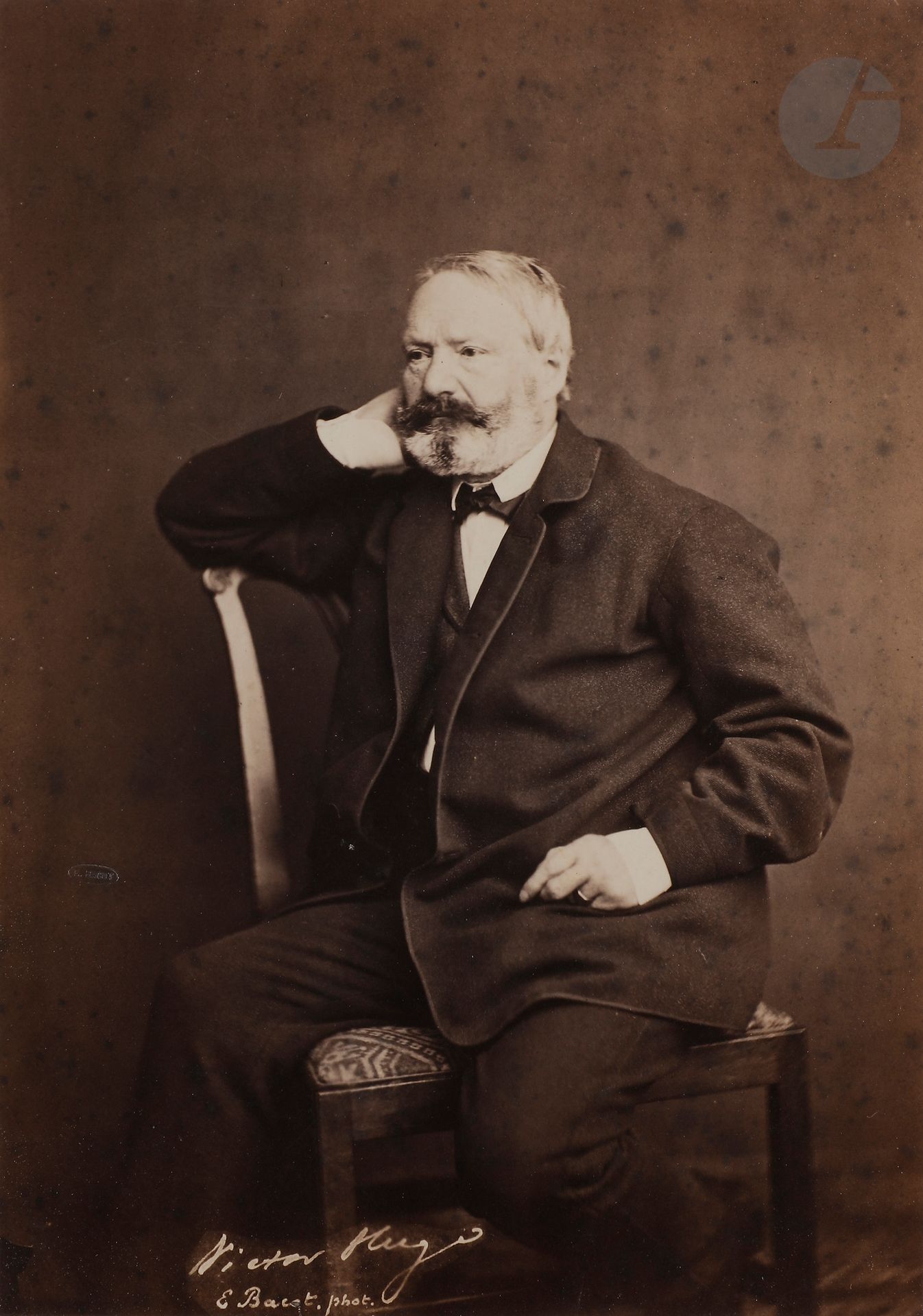 Edmond Bacot (1814-1875)
Victor Hugo, 1862.
Épreuve sur papier albuminé, contrecollée sur carton, signée et titrée dans le négatif en bas. Timbre sec du photographe à gauche. 
22,5 x 15,8 cm

Edmond Bacot (1814-1875)
Victor Hugo, 1862.
Albumen print, mounted on cardboard, signed and titled in the negative. Photographer's blindstamp in lower left corner. 
22.5 x 15.8 cm