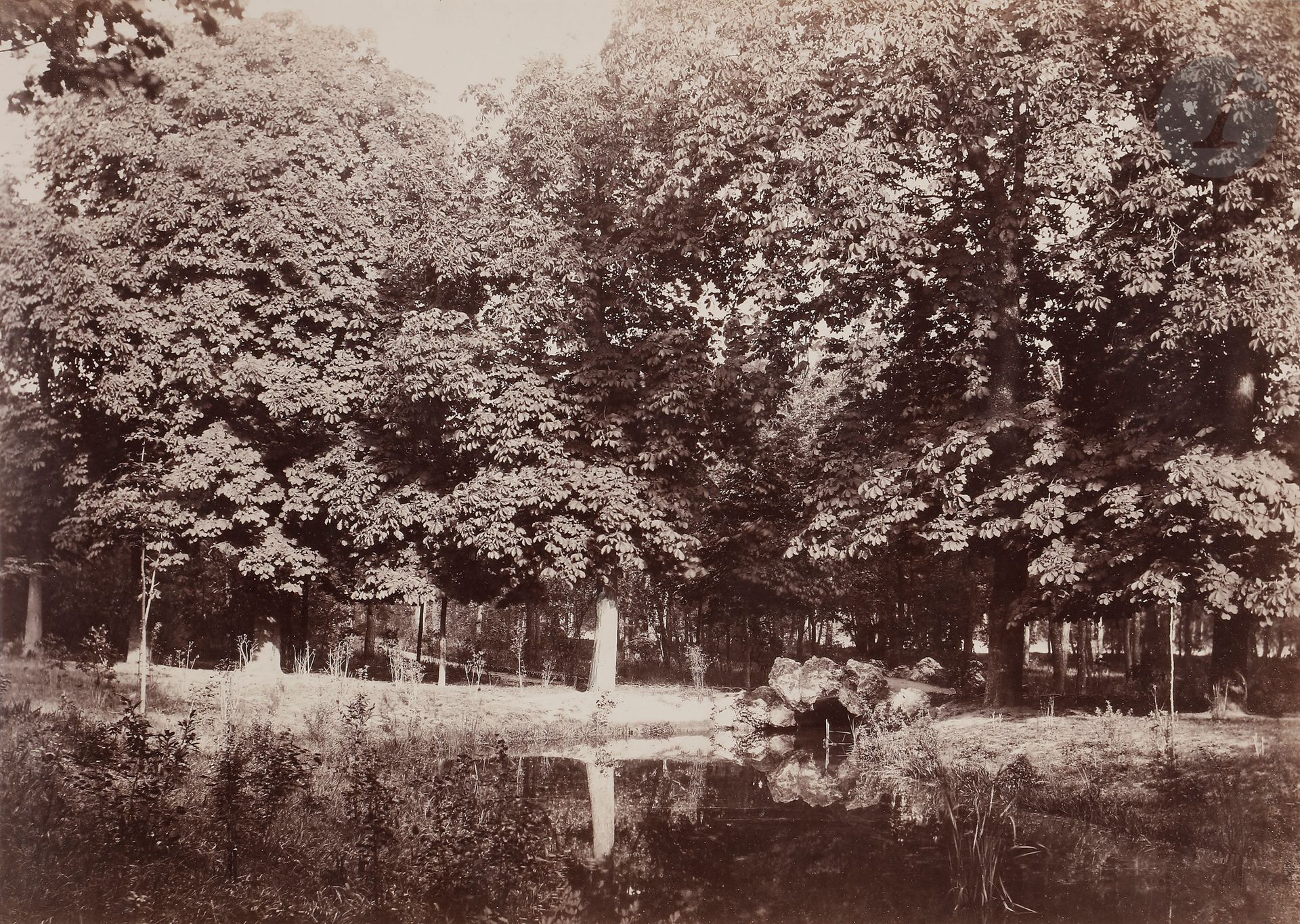 Charles Marville (1813 - 1879) 
Bois de Boulogne, c. 1858-1862. 
Pont du rocher. 
Épreuve sur papier albuminé, contrecollée sur carton. Timbre sec du photographe sur le montage en bas. 
25,7 x 36,4 cm 

Charles Marville (1813 - 1879) 
Bois du Boulogne, c. 1858-1862.   
Pont du rocher. 
Albumen print, mounted on cardboard. Photographer's blindstamp on mount. 
25.7 x 36.4 cm