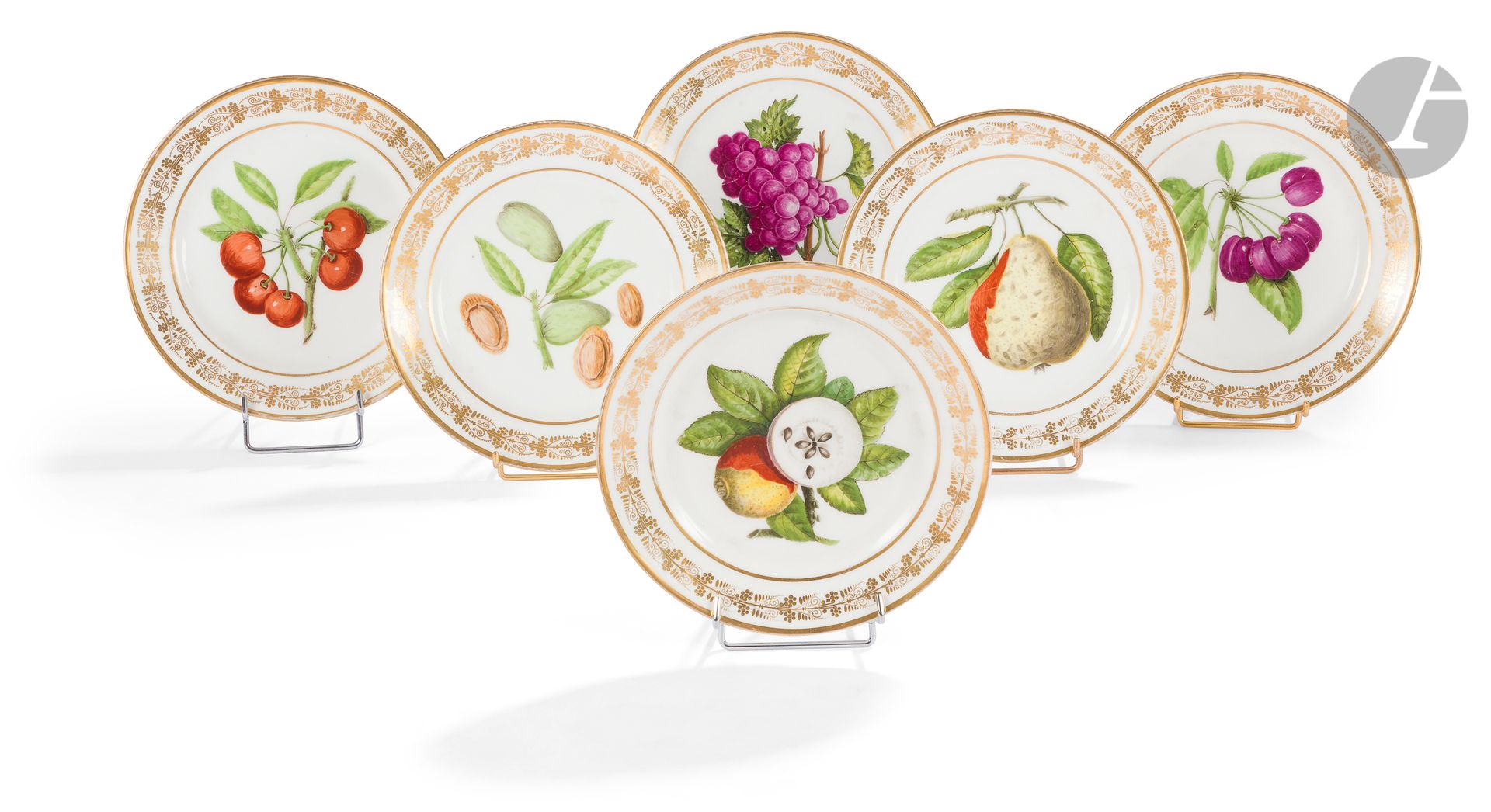 ParisSuite of
six porcelain dessert plates with polychrome decoration of fruits and foliage in the center, and frieze of foliage in gold on the edge.
Circa 1830-1840.
D: 22 cmSome
gold wear.




