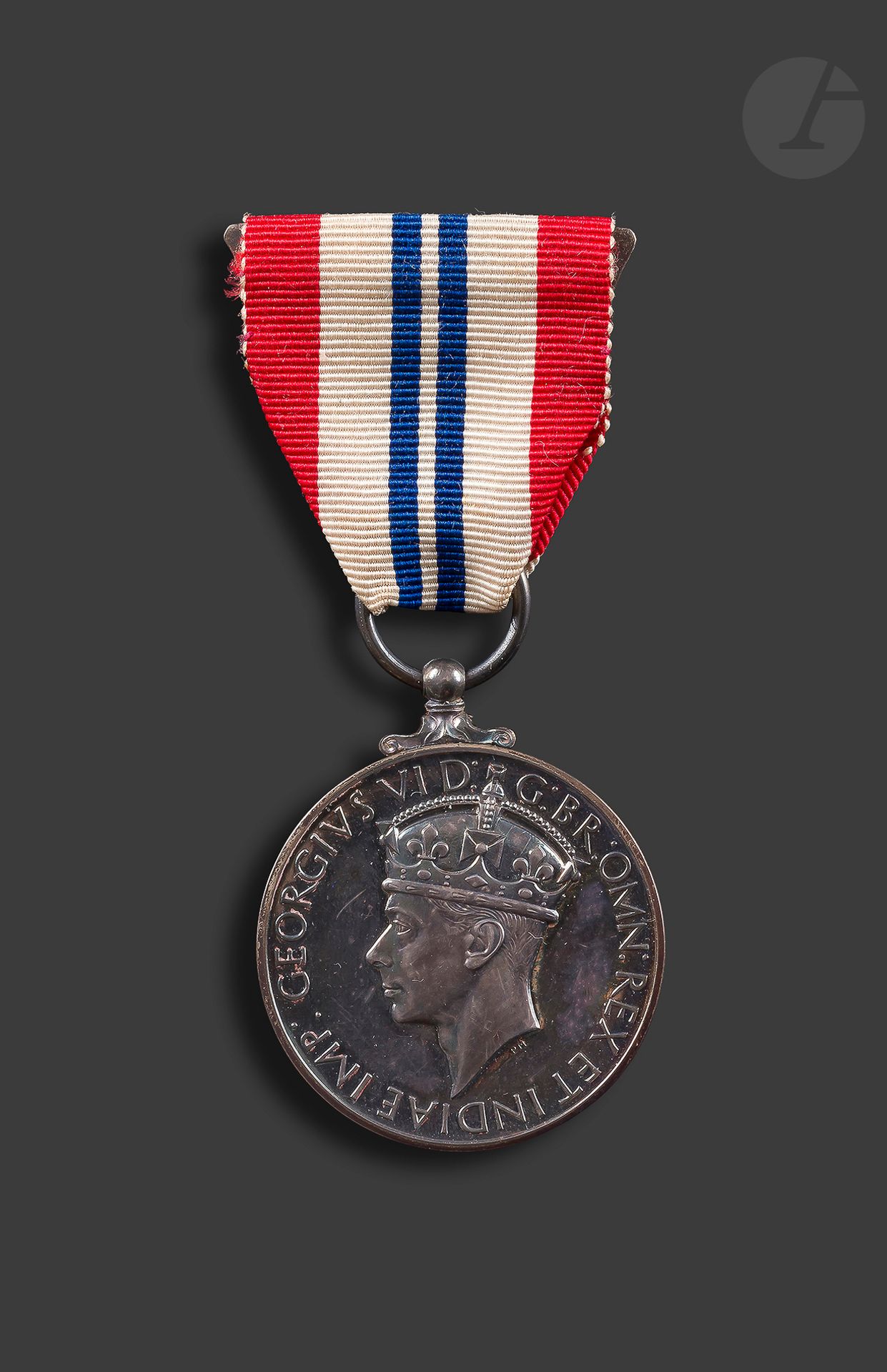 GREAT BRITAIN 
The King's Medal for courage in the cause of Freedom. In silver. Clasp ribbon. In its "Royal Mint" box.
35 mm - Gross weight: 32 gSUP
.


