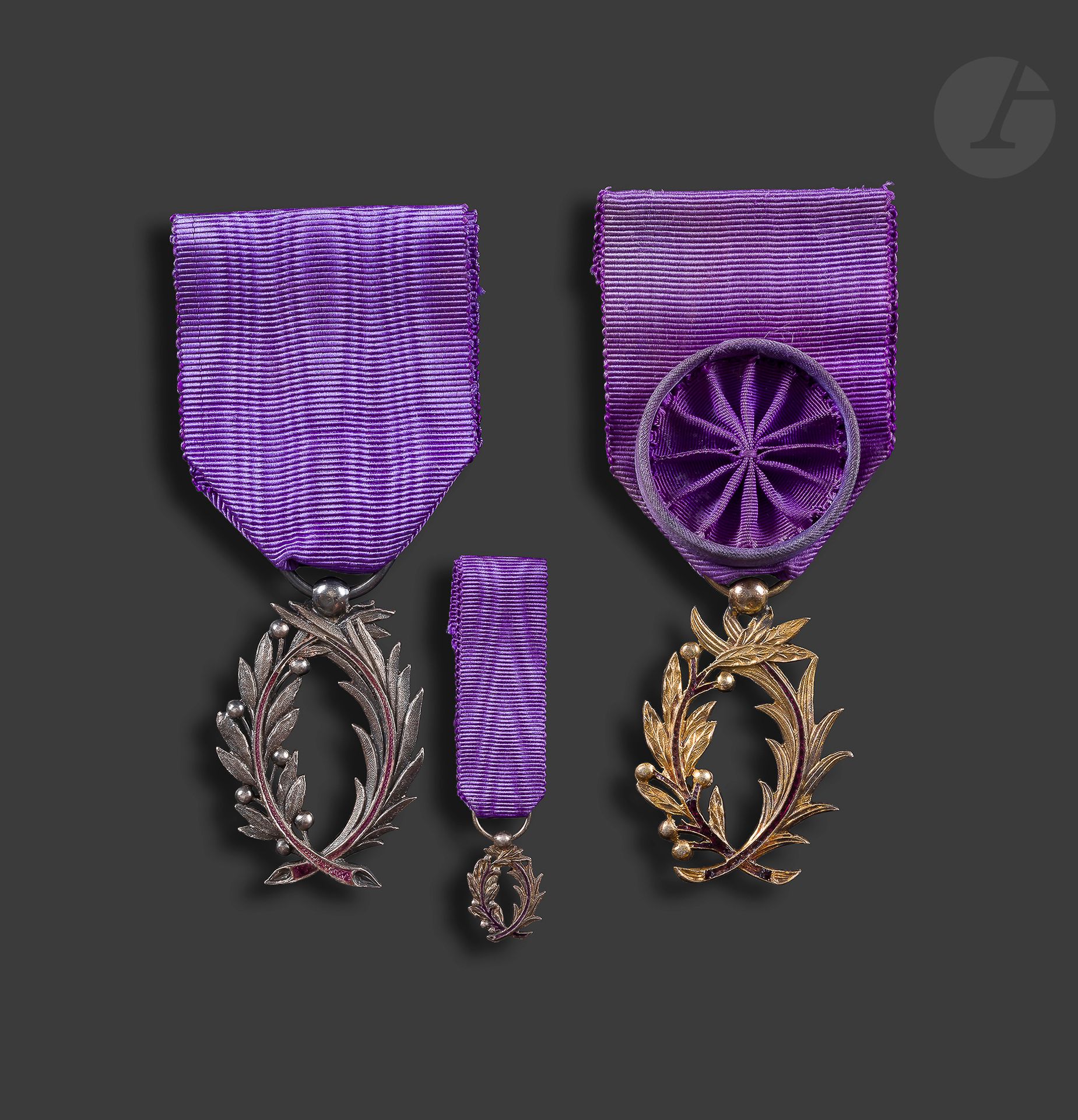 FRANCE 
ORDER OF ACADEMIC PALMS 
- an insignia of an officer of the Public Instruction in vermeil and enamel. Rosette ribbon. 
- three Knight of Education badges in silver, one in silver metal and enamel. Ribbons. 
- two miniatures of knights of public instruction, one of which is engraved, with diamond point bezel. Ribbons. Gross weight: 40 gT.
T.B.




