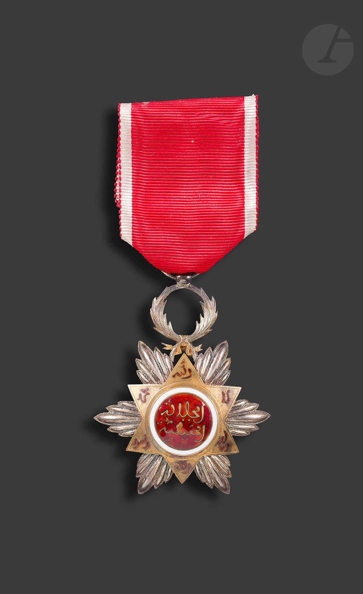 MOROCCO 
ORDER OF THE HAFIEN OUISSAM 
Grand brevet on vellum from the Grand Chancellery of the Legion of Honour for the Sergeant Major of the 6th Regiment of Indigenous Riflemen, Georges Amirault. 
Made in Paris on November 24th 1913. With painted decoration and enhanced with gold. 
39 x 49 cm 
Mounted on cardboard
. 
 
A.B.E. (Wear and tear on the fold).





