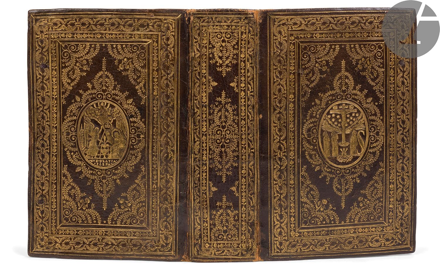 [BREVIARY].
Breviarium romanum, ex decreto sacrosancti Concilij Tridentini restitutum. Pars Hyemalis.
Paris : Societatem typographicam librorum officii ecclesiastici, 1604. - In-8, 183 x 119: (40 ff.), 843, 210 pp. and (1 f.). Dark brown morocco, boards decorated in the centre with an oval medallion representing the crucifixion on the first board and the annunciation on the second, surrounded by foliage irons and inscribed in a central rectangular compartment decorated with foliage, scrolls and flowers at the corners, the whole surrounded by a large gilt frame made of fillets, foliage scrolls and floral scrolls, remnants of ties; smooth spine richly decorated in the same spirit, gilt edges (period binding).

Edition printed in red and black, illustrated with a title vignette with the arms of Pope Clement VIII and 8 full-page figures in a splendid floral frame, engraved by Jean Messager (1580-1649) after Léonard Gaultier (1561?-1635?).
This copy is covered with a superb and rich decorated binding of the period. It has two medallions in the centre of the boards, often used at the time, representing on the first one the crucifixion with the Virgin Mary, Mary Magdalene and John, placed in such a way that they form the letters IHS, and on the second one the scene of the Annunciation. Its composition and ornaments are inspired in particular by those found on certain bindings made for the congregation of the White Penitents of the Annunciation of Our Lady. But these bindings are identified by the presence on the back of a small coat of arms of France and the motto "Spes mea Deus" of King Henry III, which are not shown here.

This copy was part of the very beautiful Catalogue of bindings from the 15th to the 19th century of the Gumuchian bookshop, published in 1929, appearing under the number 120, with a reproduction. Gumuchian attributes it to the workshop of Nicolas Eve, which is not possible since the latter died in 1581. Unfortunately, the workshop that made this binding has not yet been determined.

Missing the ties that were present at the time of the Gumuchian catalogue, renewed endpapers. Heavy soiling and staining to the leaves, tears to some. Restoration and missing at the bottom of the title.
Provenance: W. H. Corfield, with bookplate.









