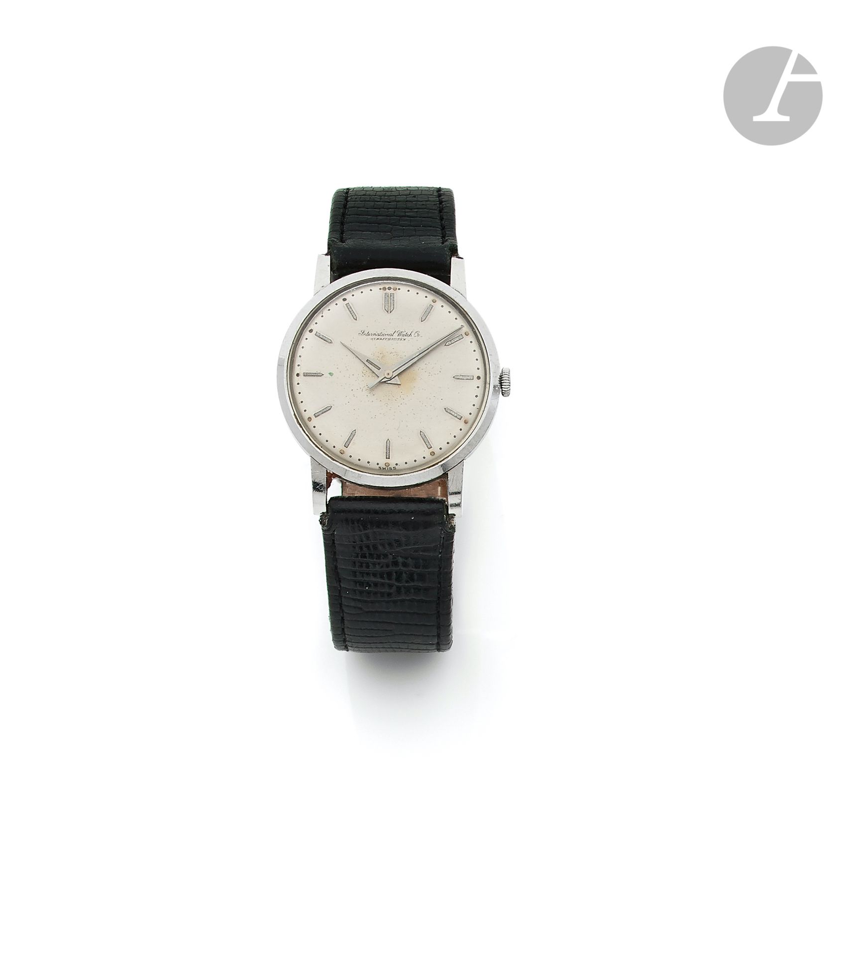 IWC. Circa 1960No.

1369244Steel men's wristwatch, white dial (piqué), applied baton hour markers, mechanical winding movement calibre C40 No. 1288119, leather strap. 
Dial, case and movement signed. 
Diameter: 33 mm



