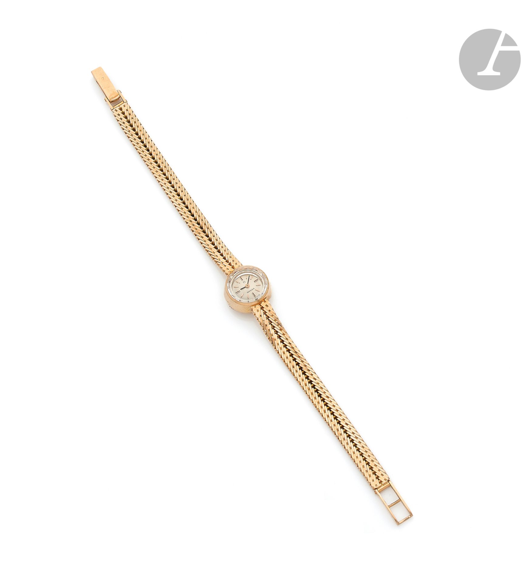 OMEGA. Circa
1960Women's 18K (750 ‰) gold wristwatch, white dial, applied baton hour markers forming the hours, mechanical winding movement, integrated 18K gold bracelet. 
Dial, case and movement signed. 
Length: 17
cmGross
weight
: 24.8 g



