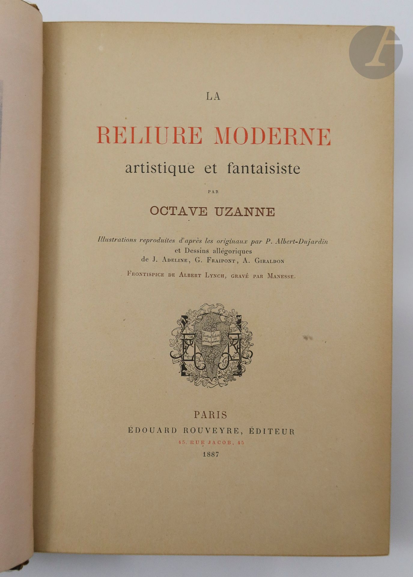 UZANNE (Octave).
La Reliure moderne artistique et fantaisiste.
Paris : Édouard Rouveyre, 1887. — In-8, reliure en cuir repoussé ornée d'un décor différent sur chaque plat, doré et peint, représentant un buste de femme de profil entouré de plumes de paon sur le premier plat, et d'un large médaillon au chiffre TD sur le second plat, dos lisse orné (reliure du début du XXe siècle).
Édition originale illustrée d'un frontispice de Lynch gravé en taille-douce par Manesse et de 72 reliures en noir ou en couleurs, reproduites à pleine page, sous serpente légendée.

Un des 1500 exemplaires numérotés sur papier vélin, celui-ci revêtu d'une splendide reliure en cuir repoussé dans le plus pur style Art nouveau, réalisée dans les toutes premières années de 1900. Celui figurant sur le premier plat porte la signature « Allynn ». Il doit vraisemblablement s'agir de Mlle Allynn, citée dans la liste des exposants aux expositions des beaux-arts en 1904, dont les spécialités mentionnées étaient les cuirs et les velours d'art.

Dos et bord supérieur du premier plat passés. Charnière du premier plat fendu, accroc à la coiffe de tête, frottements d'usage. Première et dernière gardes défaites.