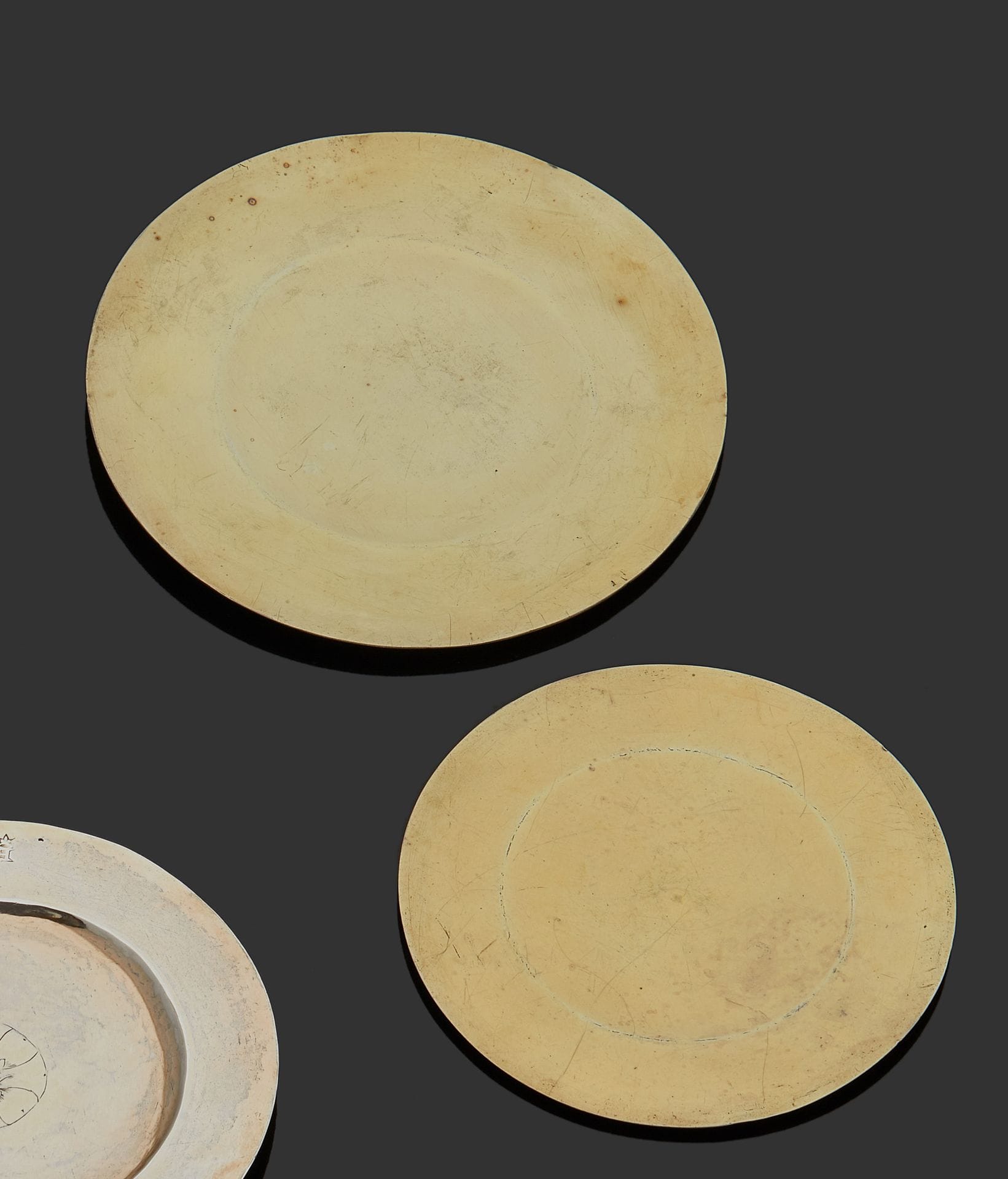 TOULOUSE 1662 and 1683
Two patens in plain vermeil.
Master goldsmith : Michel GOUZY, received in 1660 for one and Michel Barthelemy CODAUTE, received in 1676 for the second. 
 Weight : 180,2 g - diameter : 14,5 cm and 12,1 cm
Condition : the border of the one of 1662 to be replanted
TOULOUSE 1662 and 1683
Two vermeil patens 
Master silversmith : Michel GOUZY for one and Michel Barthelemy CODAUTE for the other