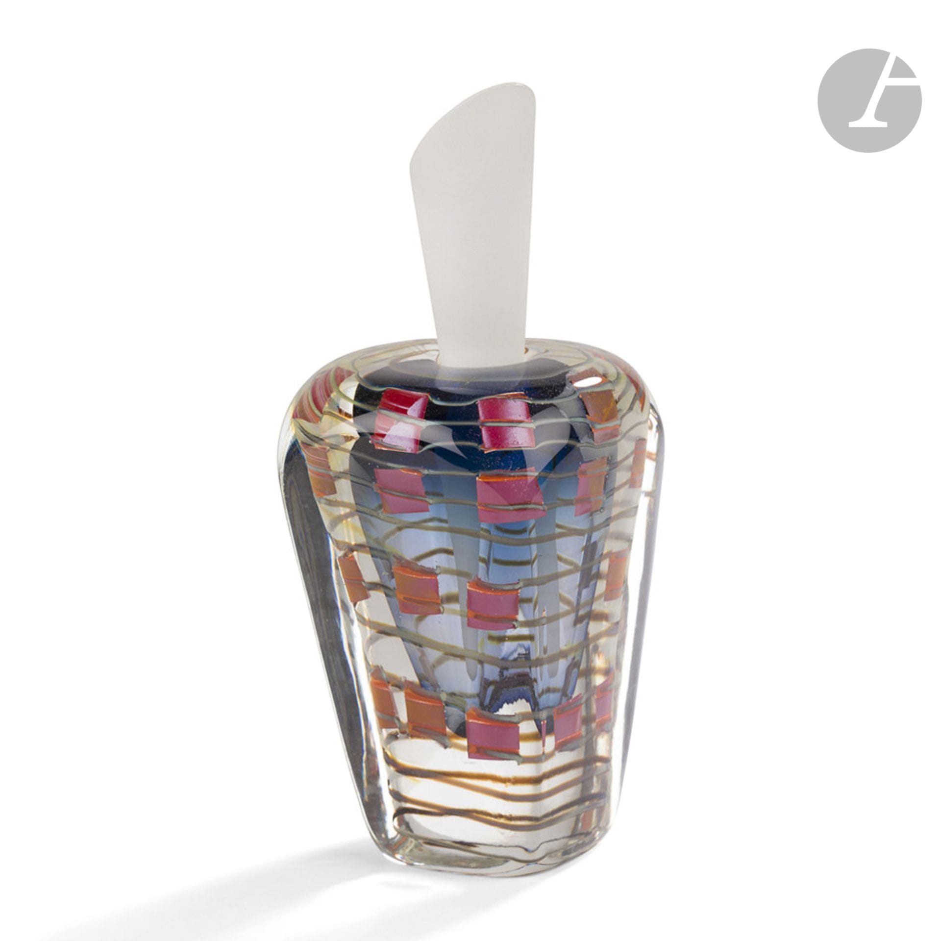 Nicolas MORIN [FRANCE] (born in 1959
)Blown glass bottle with grey twisted decoration, enhanced with small orange and pink squares, transparent sandblasted cone-shaped stopper. Signed and dated 31.07.2000 under the base. H. 20 cm - W. 9 cm - D. 9 cm
