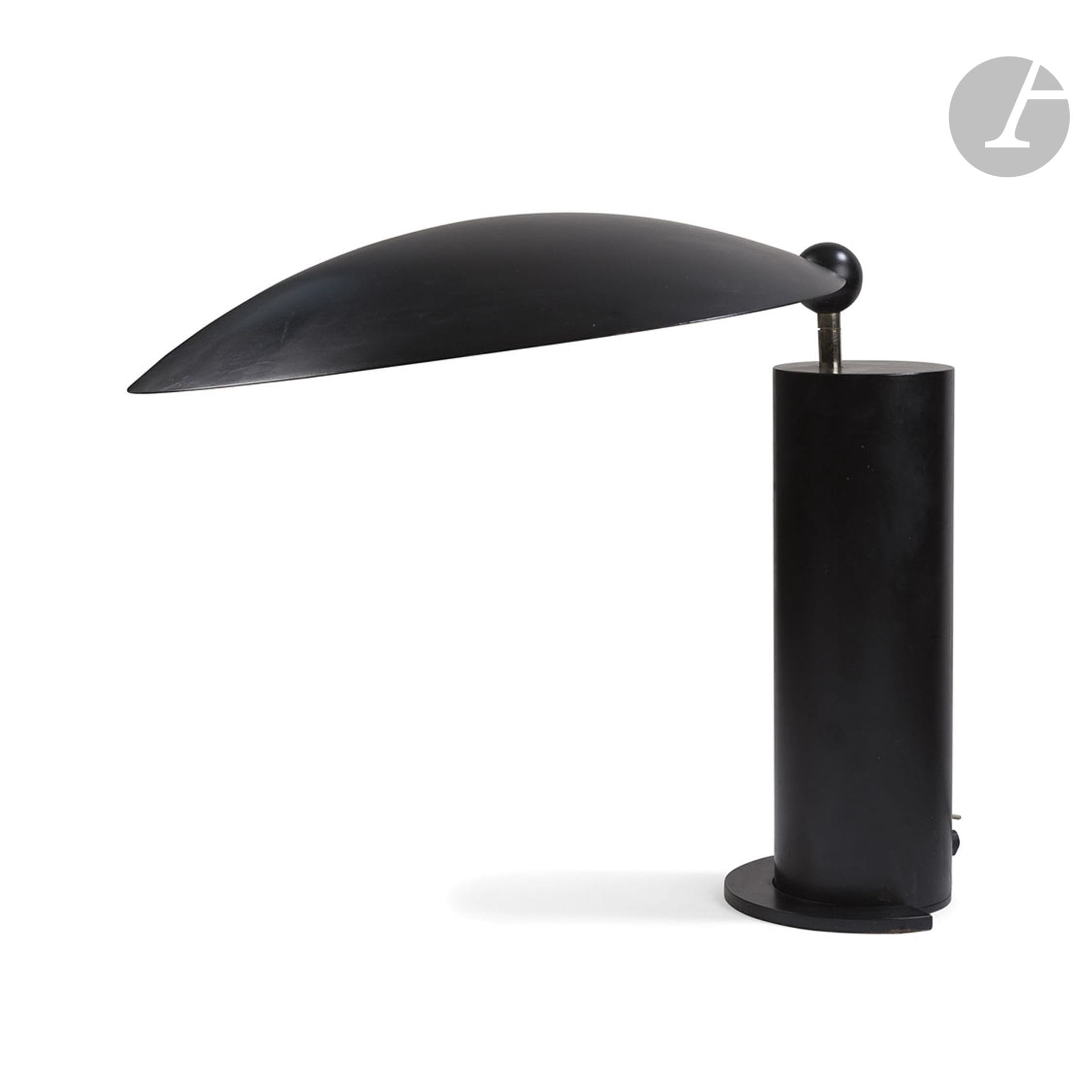 JEAN-MICHEL WILMOTTE (b. 1948) & LUMEN CENTER PUBLISHERWashington
, the model designed in [1983]
Table lamp. The base and cylindrical shaft in black lacquered cast iron; the circular swivel shade in black lacquered sheet metal. H. 38 cm - D. 43 cm

