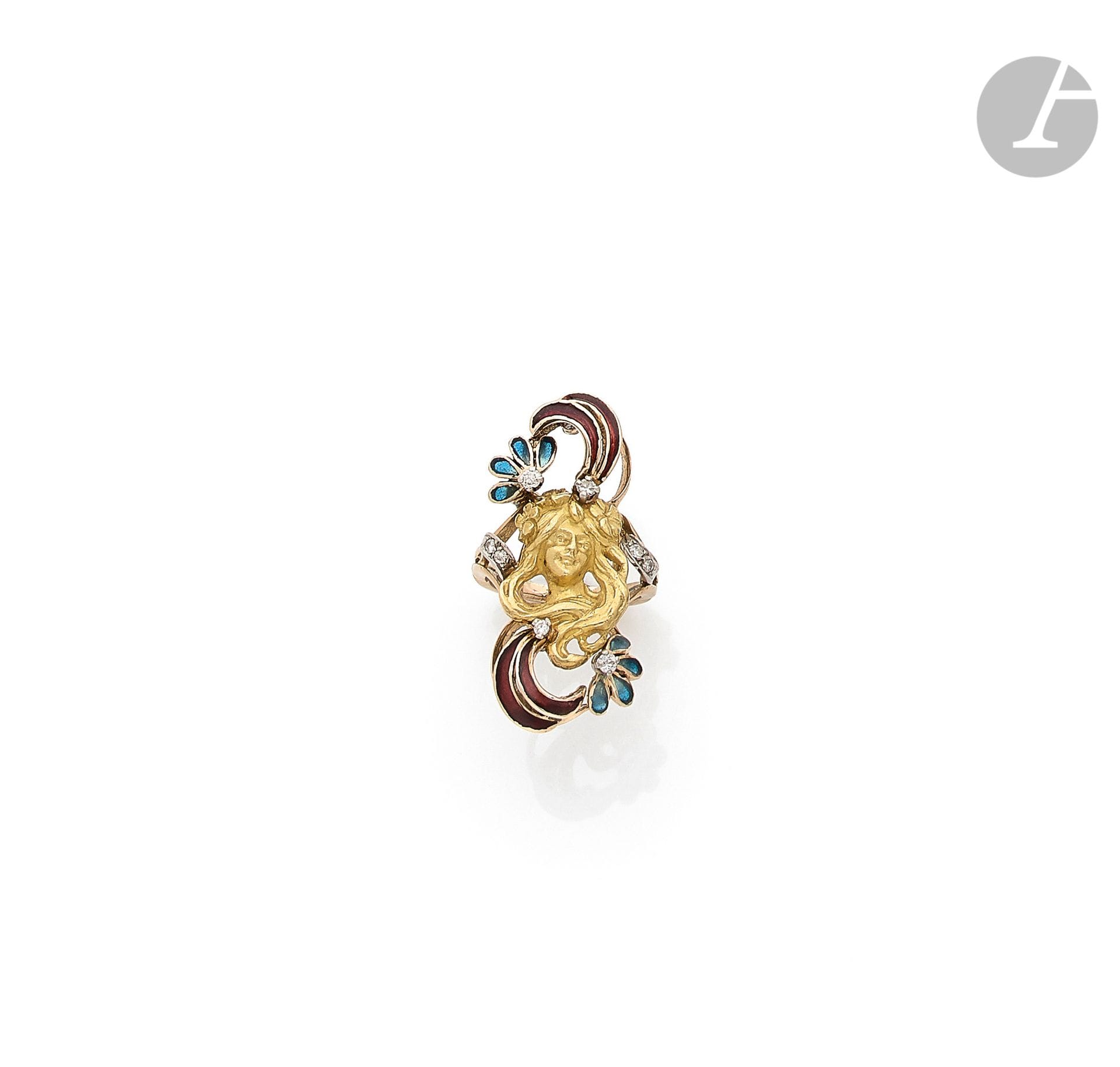 An 18K (750) gold ring, featuring a young woman-flower, the setting in red enamelled plumes and blue flowers, set with round diamonds on platinum. French work from the early 20th century. Finger size : 51. Height of the motif : 3,7 cm approximately. Gross weight : 11,6 g



A french Art Nouveau enameled ring