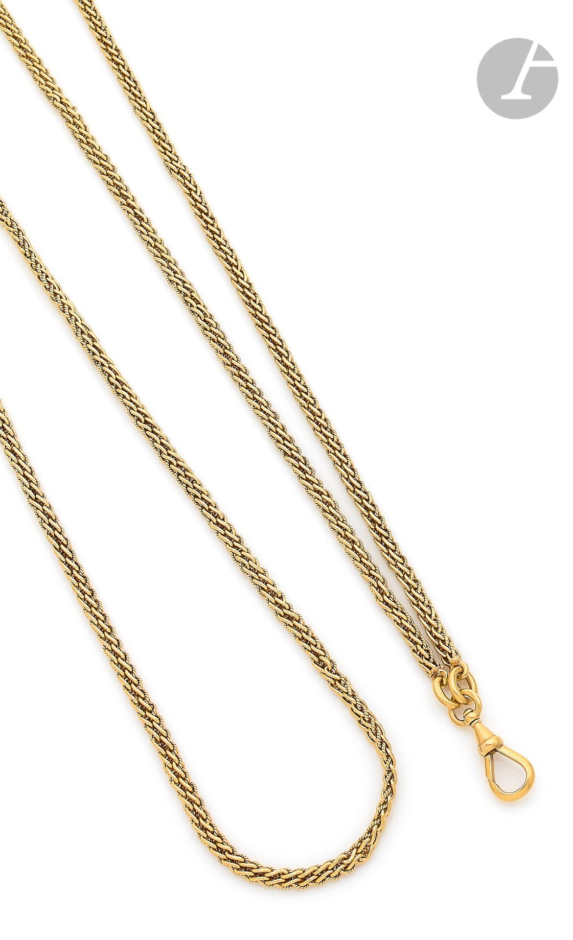 Chaîne de montre en or 18K (750). Travail du début du XXe siècle. Longueur : 168 cm environ. Poids : 101,1 g



An early 20 th century chain