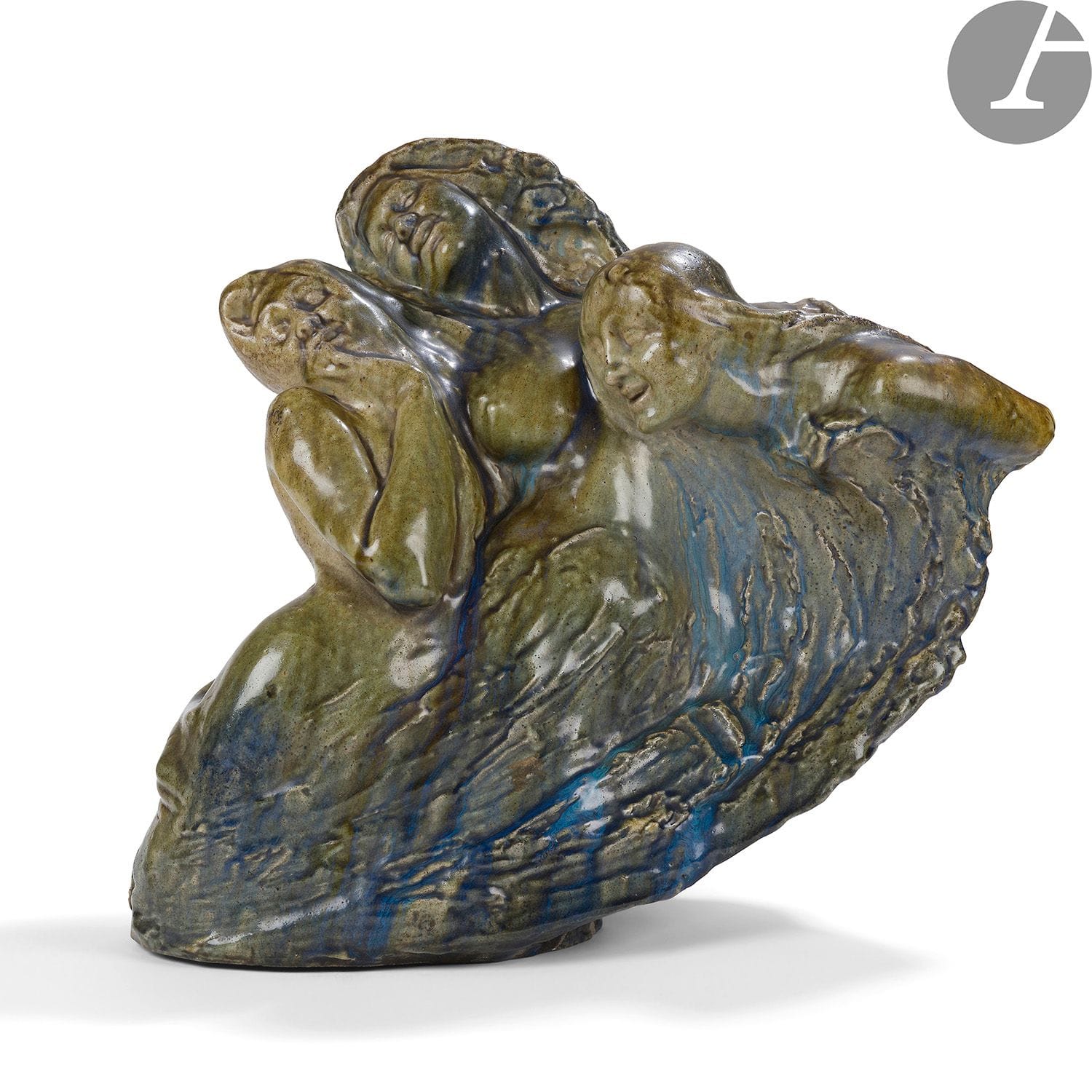 WACLAW SZYMANOWSKI (1859-1930) SCULPTEUR & MANUFACTURE ÉMILE MULLER À IVRY-SUR-SEINE – COLLECTION MARIE-CHRISTINE DAVID
Śmiejąca się fala (La vague souriante), le modèle créé en [1902], le modèle présenté au Salon de la Sécession, Vienne, 1902
Important groupe.
Épreuve en grès émaillé polychrome.
Circa 1900.
Un léger éclat d’émail à la base.
Signé SZYMANOWSKI et porte la mention Grès Émile MULLER en creux sous couverte à l’arrière au dos.
Hauteur : 48 cm – Longueur : 55 cm – Profondeur : 23 cm

Provenance :
Succession Marie-Christine David.

Expositions et œuvres en rapport :
- Salon de la Sécession, Vienne, 1902 – Une épreuve de notre groupe (sans précision du matériau) présentée lors de cette manifestation.
- Salon de la Société des Beaux-arts de Cracovie, 1903 – Une épreuve de notre groupe (sans précision du matériau) présentée lors de cette manifestation.
- Salon de la Sécession, Vienne, 1911-12 – Une épreuve en plâtre du modèle de notre sculpture présentée sous le n° 5 du catalogue lors de cette manifestation.
- Waclaw Szymanowski 1859-1930 – Exposition rétrospective au Musée national de Varsovie, 1981. Une épreuve du modèle de notre sculpture présentée sous le n° 53 du catalogue lors de cette manifestation.

Bibliographie : 
Hanna Kotkowska-Bareja – Waclaw Szymanowski 1859-1930 – Catalogue de l’exposition au Musée nationale de Varsovie en 1981, éditions du Musée national de Varsovie, Varsovie, 1981. Une épreuve du modèle de notre sculpture référencée et reproduite sous le n° 53.