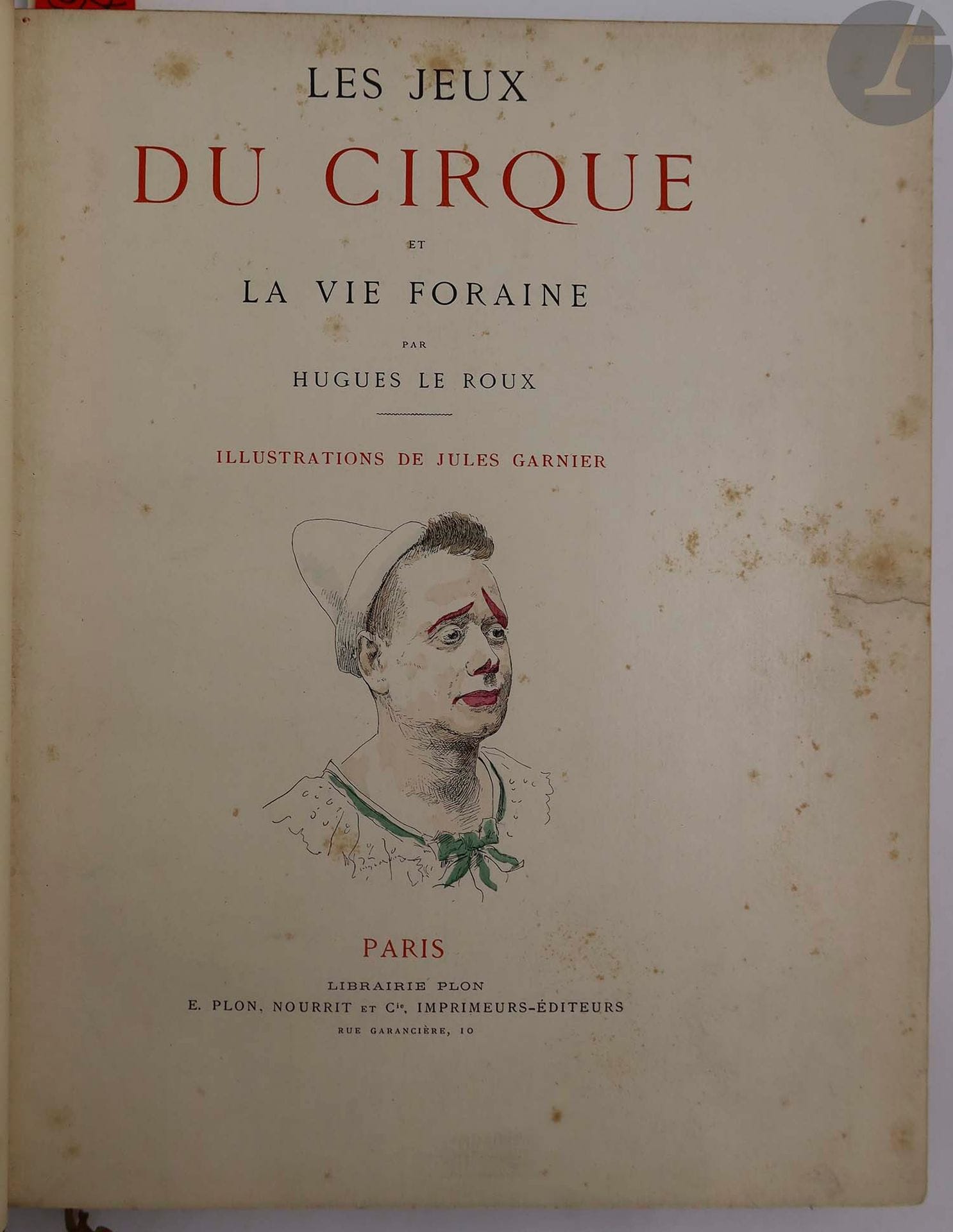 LE ROUX (Hugues).
Les Jeux du cirque et la vie foraine.
Paris : Librairie Plon, E. Plon, Nourrit et Cie, [1889]. — In-4, demi-maroquin havane à coins, filets dorés, dos à nerfs orné d'un clown, d'un contorsionniste et d'un cheval mosaïqués de différents maroquins, tête dorée, non rogné, couverture et dos conservés (Affolter).

Édition originale de ce superbe ouvrage consacré au cirque et aux saltimbanques, illustrée en premier tirage de plus de 230 compositions dans le texte de Jules GRANIER, coloriées au pochoir.

Un des 50 exemplaires numérotés sur papier de la Manufacture impériale du Japon (n° 41).

Très belle reliure mosaïquée d'Affolter.
Rousseurs à la couverture.