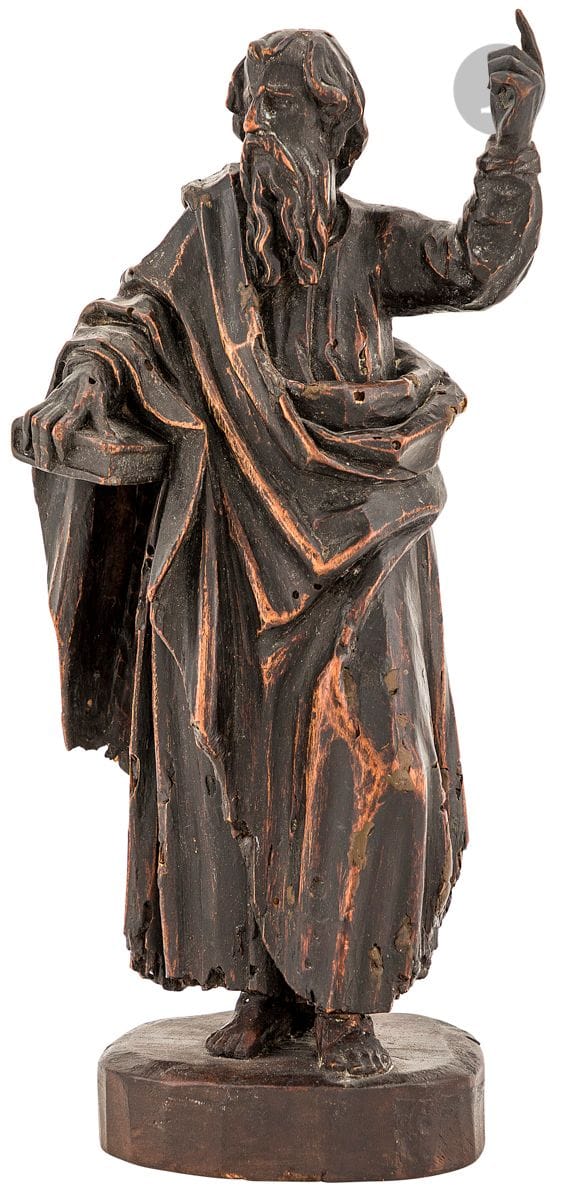 Saint évangéliste en bois sculpté et patiné noir. 
Italie, début du XVIIe siècle
H : 30,5 cm. 
(base postérieure, vermoulures et restauration)