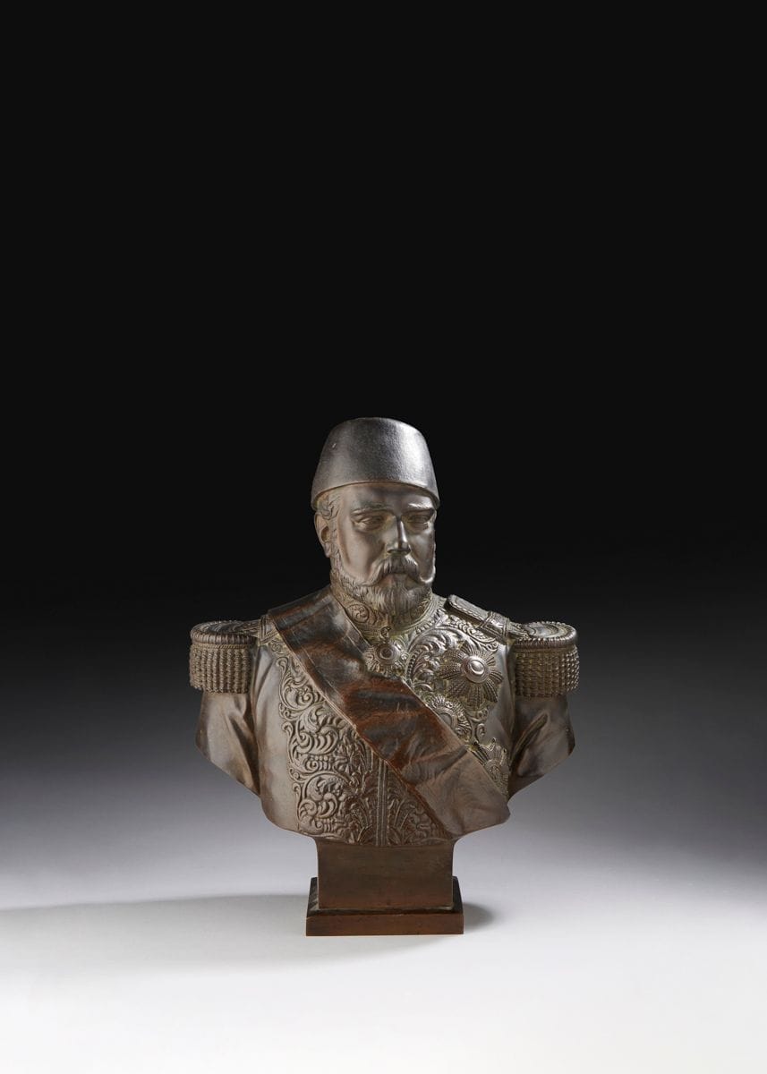 Charles Cordier (1827-1905
)Ismaïl Pacha (1830-1895) Viceroy then Khedive of EgyptCirca
1867Bronze
with a brown patinaH
: 41.5 cmProvenance

:
The artist's family by descent.

Related work: 
- Charles Cordier, Ismaïl Pacha (1830-1895) Viceroy then Khedive of Egypt, 1866, marble bust, H: 89 cm, Cairo, Manial Palace Museum
. 


Related literature: 
Laure de Margerie, Édouard Papet, Charles Cordier, 1827-1905: the other and the elsewhere, cat. exp, Paris, Musée d'Orsay, 2 February-2 May 2004, Quebec, Musée national des Beaux-arts, 10 June-6 September 2004, New York, Dahesh museum of Art, 12 October 2004-9 January 2005, Paris, Éditions de la Martinière, 2004, models listed from no. 290 to no. 294, p.178During
his stay in Egypt in 1866, Cordier met Ismaïl Pacha, son of Ibrahim Pacha, the Viceroy of Egypt
.
He painted his portrait in ceremonial uniform, the marble bust is now kept in the Cairo museum. It is in the form of a bronze reduction, with several patinas, golden or silver, that this bust is most frequently represented. Five examples in this form are listed, in addition to ours, in the catalogue of the Orsay exhibition in 2004.













