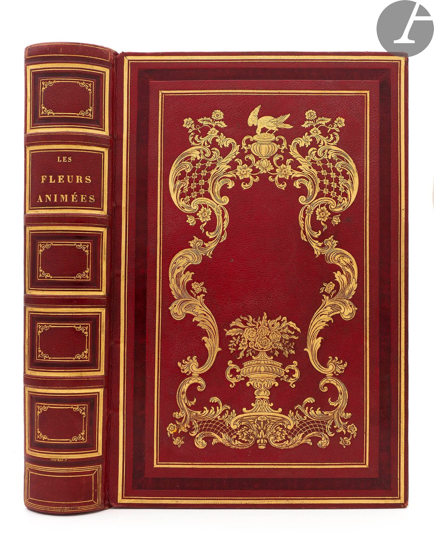 [GRANDVILLE].
Flowers animated by J.-J. Grandville. Introductions by Alph. Karr. Text By Taxile Delord. First [-Second] part.
Paris : Gabriel de Gonet, 1847. - 2 parts in one volume in-8, 267 x 178 : frontispiece, 262 pp. 28 plates ; frontispiece, (2 ff.), pp. (263)-364, IV, 62 pp., (1 f.), IV pp. (65)-132, 24 plates. Red morocco, framed with a broad cold fillet between four gilt fillets and gilt rocaille plate in the centre of the boards, spine ribbed and decorated, red morocco framing inside, decorated with gilt fillets and motifs, white moiré silk lining and endpapers, gilt edges (Corfmat).

First edition of this famous collection of tales inspired by flowers and composed by Alphonse Karr, Taxile Delord and Louis-François Raban, the latter presented under the pseudonym of Count Foelix.

It is undoubtedly one of the most original and attractive books illustrated by Grandville. It is decorated with two woodcut frontispieces in colour by Porret and Quichon, and 50 colour plates engraved on steel by Geoffroy. The majority of the illustrations represent human beings disguised as flowers, sometimes accompanied by animals whose manner is human.

A court case in 1867 established that only part of the illustration was by Grandville. The book was published in 1847, the same year that Grandville died in the hospital in Vanves of a fit of madness. Grandville had only had time to execute about fifteen drawings and to examine about fifteen others.

At the end of the second part is the Botanique et horticulture des dames by Fœlix, with an introduction by Alphonse Karr, illustrated with two black botanical plates.

A first edition copy, in a strictly period binding signed by Corfmat active from 1825 to 1860, who worked mainly for Queen Marie-Amélie and the princes of the royal house.
Silk of the endpapers partly detached. Some foxing.












