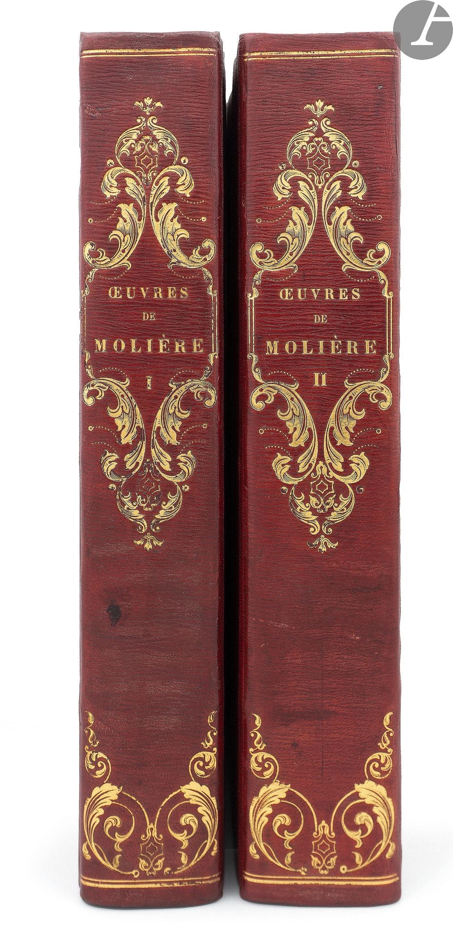 MOLIÈRE.
Œuvres. 
Paris : Paulin, 1835. — 2 volumes in-8, 262 x 167 : frontispice, 768 pp., (2 ff. dernier blanc), couverture imprimée ; 895 pp., couverture imprimée. Demi-maroquin rouge à long grain à coins, filets dorés, dos lisse ancien orné rapporté, tête dorée, non rogné, couverture et dos conservés (Champs-Stroobant Sr).

Très belle édition des œuvres de Molière, « fort estimé(e) à juste titre pour son admirable illustration » (Carteret) qui comprend un portrait de Molière en frontispice et 800 vignettes dans le texte, gravés sur bois d’après les compositions de Tony Johannot.
L’édition débute par une notice sur la vie et les ouvrages de Molière par Sainte-Beuve.
Bel exemplaire, complet des couvertures datées de 1836, relié par Jean Stroobants au début du XXe siècle, qui a rapporté pour la décoration les dos d’une reliure de l’époque d’un autre exemplaire, ornés de beaux fers rocailles.
Rousseurs touchant le portrait. Rousseurs éparses et quelques feuillets brunis.
Provenance : G. de Bayser, avec ex-libris.