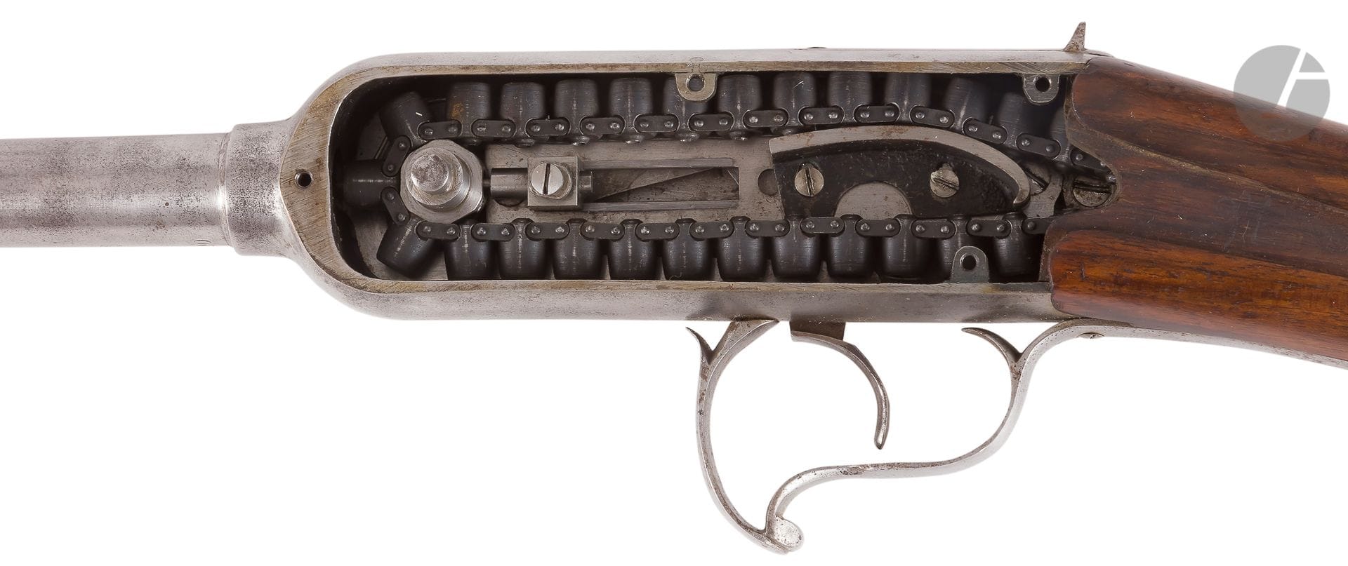 Rare "Gay-Guenot" rifle with rotating chain magazine, 40 rounds, 11 mm caliber
. Steel frame, plain, with flat sides, with safety on the left side.
Chain magazine sight with sliding shutter on top.
Stock in drowning numbered with the iron "289".
Length: 96 cmN°
12*B
.E

.

(Missing the point of sights) Carries a pastille of collection N° 231. 

Provenance:
Former Marsan collection, n° 231Gay

Paulin, civil engineer and inventor of multiple shot weapons, known as pocket machine guns, revolvers and rifles with 25, 40, 50 and 100 shots (1879)


.



Dealer: Henri GUENOT, 183 rue Saint-Denis (Paris).
It seems that GAY is the true inventor of the system with chain, called system Guycot (Lewis Winant). GAY & GUENOT patented it in London on 17 January 1879.












