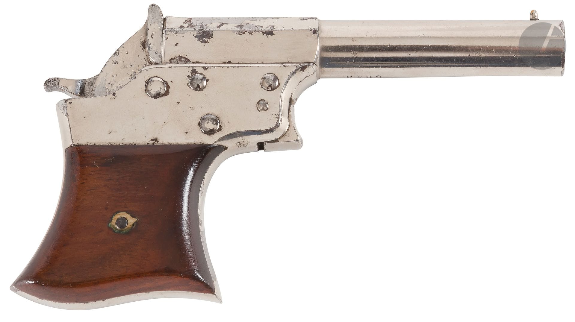 Remington Vest Pocket Pistol, single shot, 41 caliber rimfire extractor.
Round barrel with sides to the thunder marked "Remington Illion NY Palet Oct 1 - 1861 Nov 15 - 1861. Spurred trigger. Nickel plated finish. Walnut stock plates.
B.E. N° 39**
(small trace of lack of nickel plating)
.

Length: 14 cmManufactured of

1865 to 1888





.













