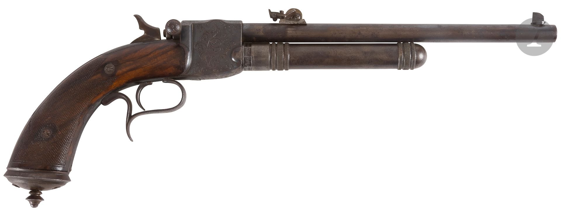 Paul Giffard" liquefied gas bolt action pistol, Carbona model, single shot, 4.5 mm caliber.
272 mm round
barrel
, marked "STEPHANOISE D'ARMES - ST ETIENNE", with adjustable rise. Carcass engraved with foliage scrolls.
Tubular gas tank cartridge, grooved, screwed under the barrel. 
trigger guard rests finger in continuation. 
Plates of stick in drowning partly squared.
Length: 44 cm 
B.E. Pitting marks on the left side
. 


Paul Giffard: Inventor of the rifle and the pistol tank with liquefied gas. 
Patent of 1862 for a weapon of living room, hunting, war, with compressed air.








