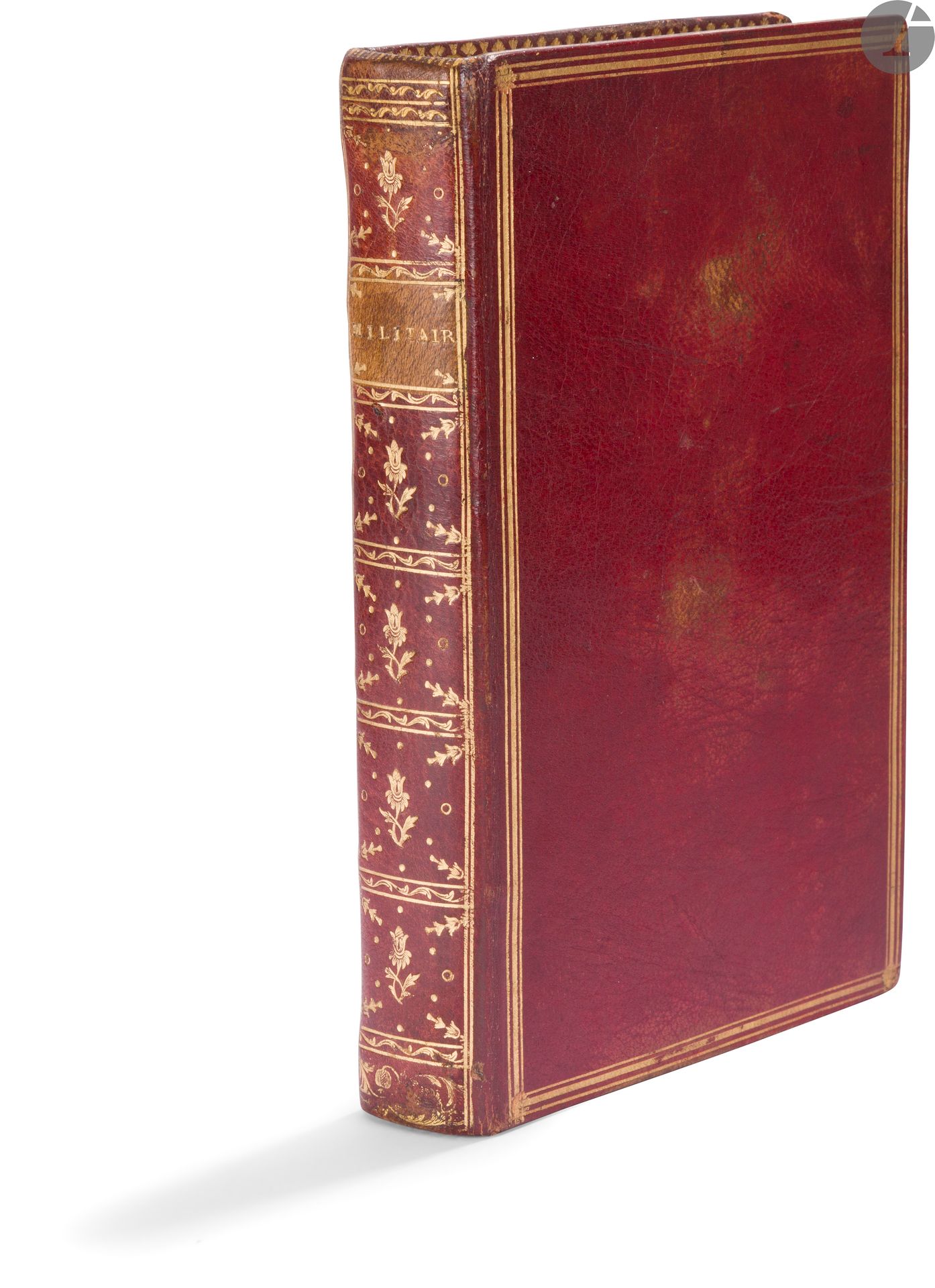*[MILITARIA].
Etat militaire de la France [au titre : Militaire ; première vignette gravée avec mention : « Extrait de l’Etat du militaire de France 1777 »].
En français, manuscrit sur papier ; divisions avec vignettes gravées.
France, XVIIIe siècle (après 1777).

[7] ff. non ch. + 274 pp., suivis de [4] ff. blanc, manuscrit complet, fine écriture calligraphiée à l’encre, différentes parties introduites par des vignettes gravées instruites à l’encre, le reste des feuillets entièrement manuscrits. Reliure de plein maroquin rouge, dos lisse cloisonné et fleuronné, pièce de titre « Militair[e] », triple filet doré en encadrement sur les plus, avec filet du milieu plus épais, filet doré sur les coupes, roulette intérieure, gardes de tabis bleu, tranches dorées (plats un peu frottés, rousseurs au papier par endroits). 
Dimensions : 200 x 130 mm
Provenance : (1) Vignette ex-libris gravée de Jean Gigodot, contrecollée sur le contreplat supérieur. – (2) Vignette ex-libris de Charles Van der Elst (1904-1982), président de la Société Royale des Bibliophiles et Iconophiles de Belgique, contrecollée au verso de la première garde.